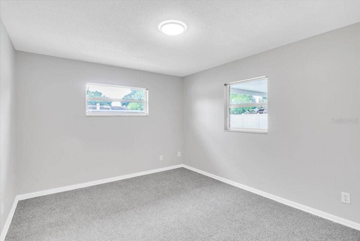 715 S RANGER BOULEVARD, Winter Park, FL 32792 Bedroom #4 with new carpeting and paint.