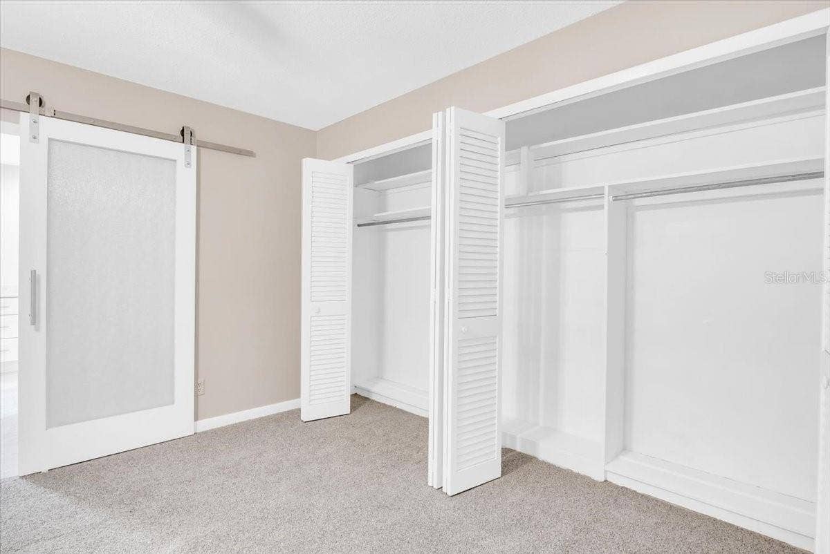 715 S RANGER BOULEVARD, Winter Park, FL 32792 Primary suite closet.