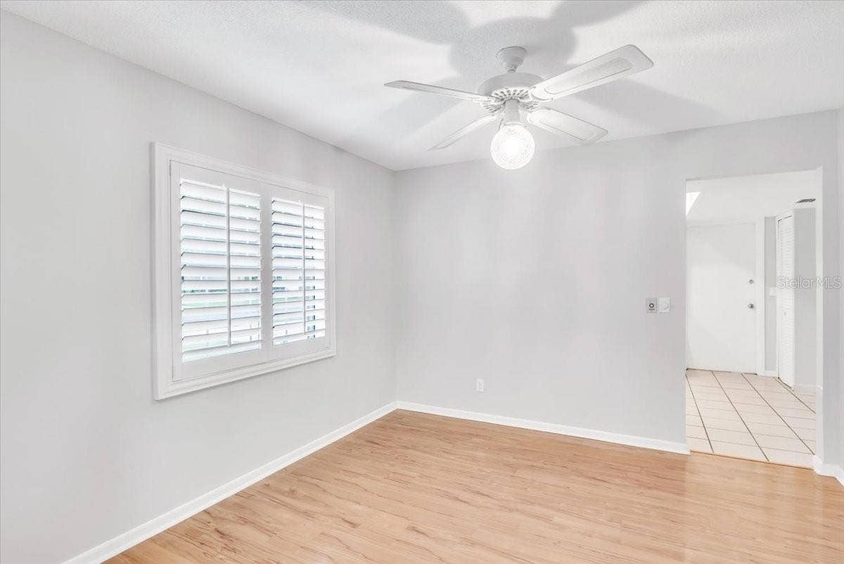 715 S RANGER BOULEVARD, Winter Park, FL 32792 Dining area with beautiful hardwood floors and plantation style shutters.