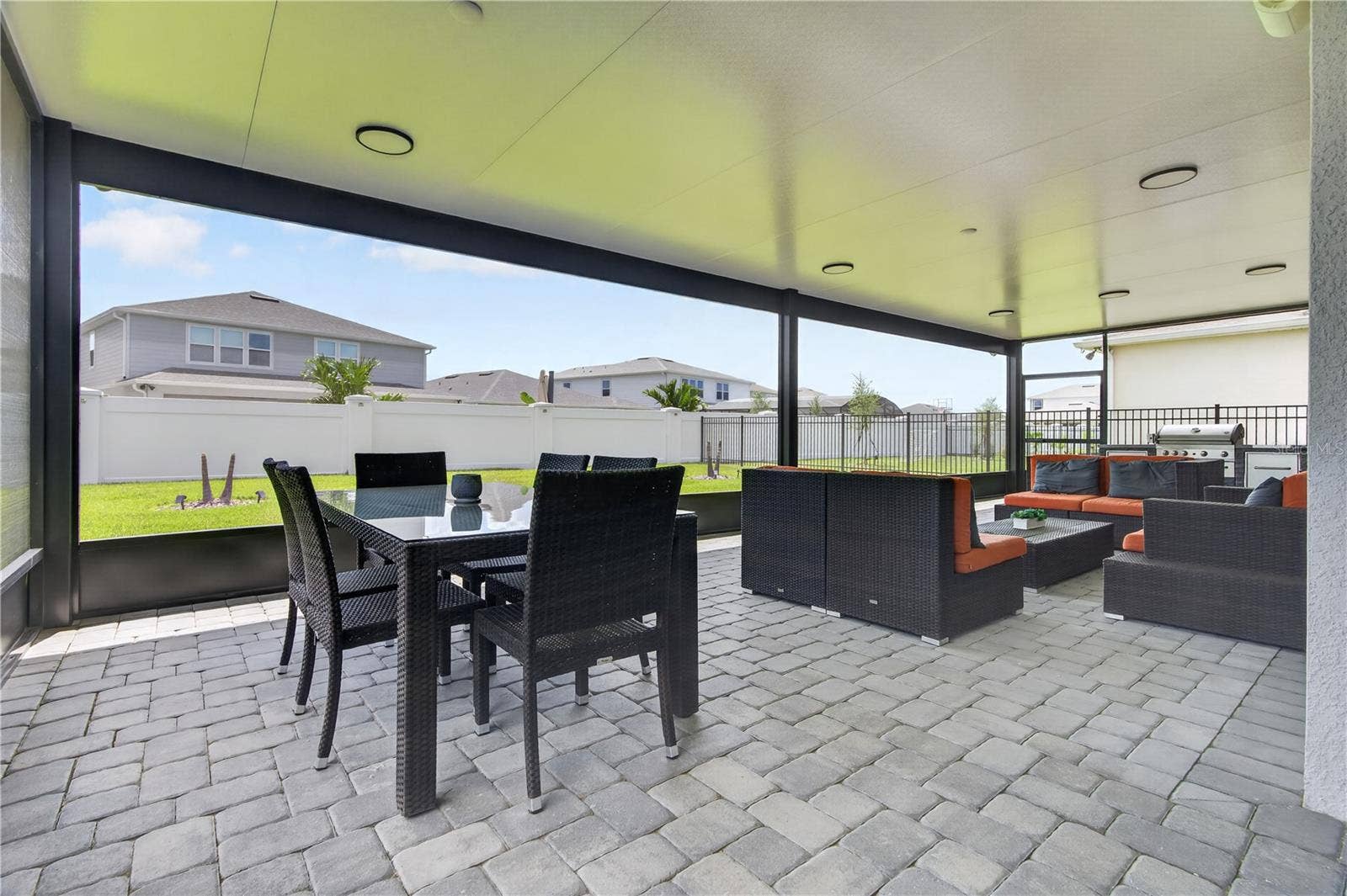 7239 IVY TENDRIL AVENUE, Orlando, FL 32829 SUPER-SIZED SCREENED PORCH!