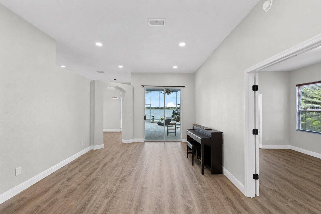 10273 COVE LAKE DRIVE, Orlando, FL 32836 Foyer/Living Room with View to Master Suite & Patio