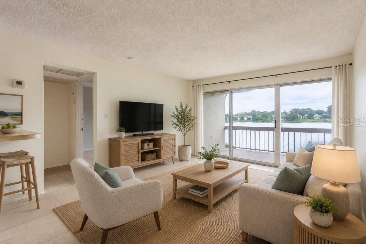 Lake View from Main Main Living Area with Lake View Virtually Staged