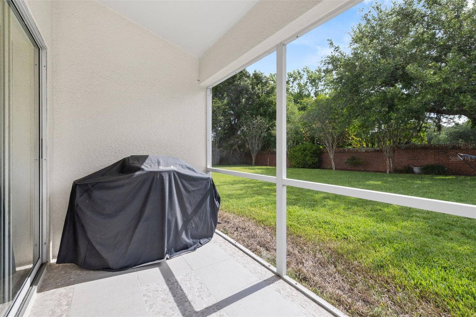 4638 RAINTREE RIDGE ROAD, Orlando, FL 32837 Screened In Lanai