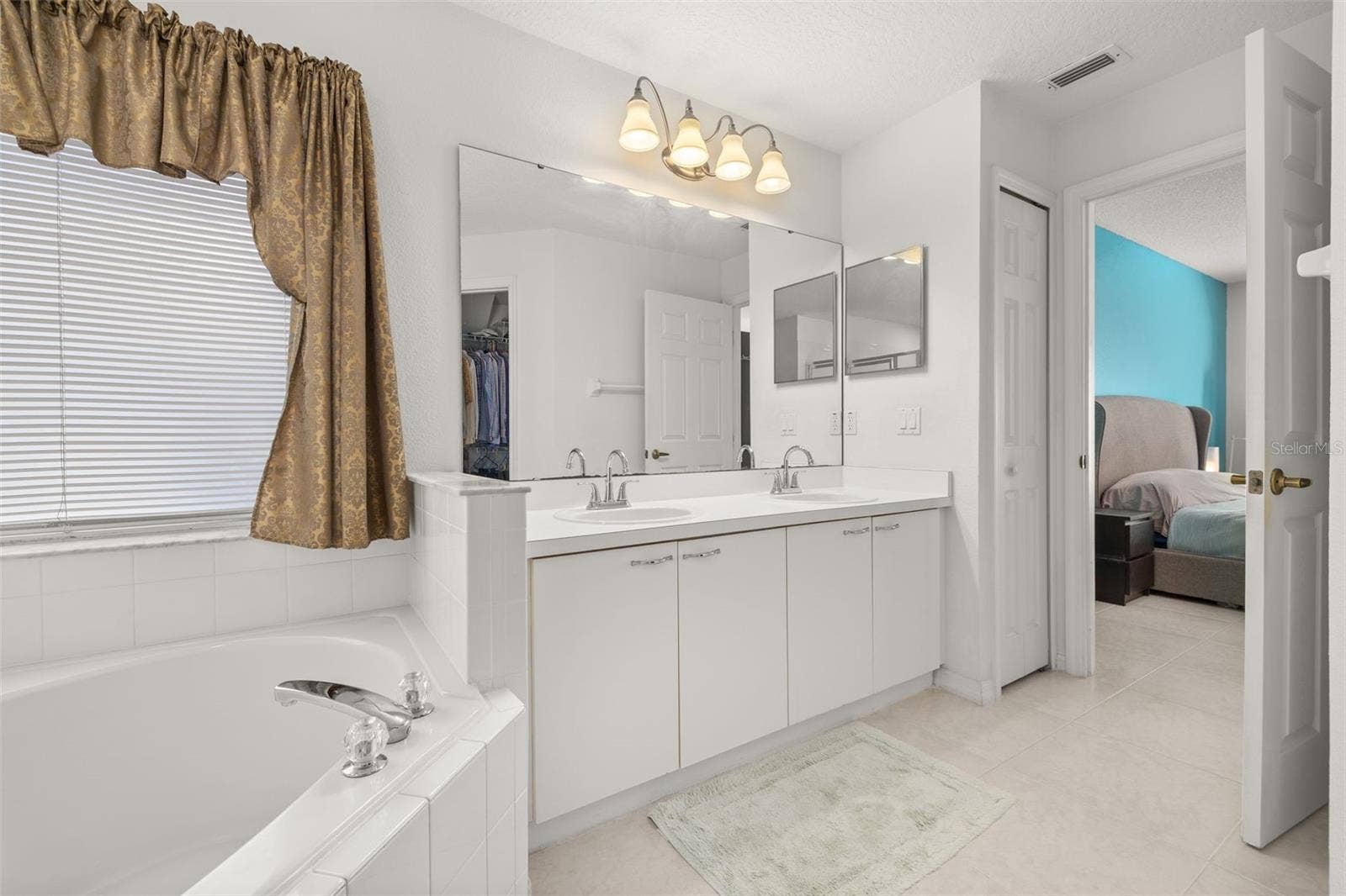 4638 RAINTREE RIDGE ROAD, Orlando, FL 32837 Primary En Suite Bathroom