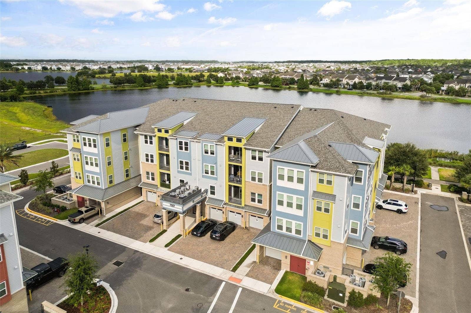 7557 LAUREATE BOULEVARD, #6208, Orlando, FL 32827 condo building exterior