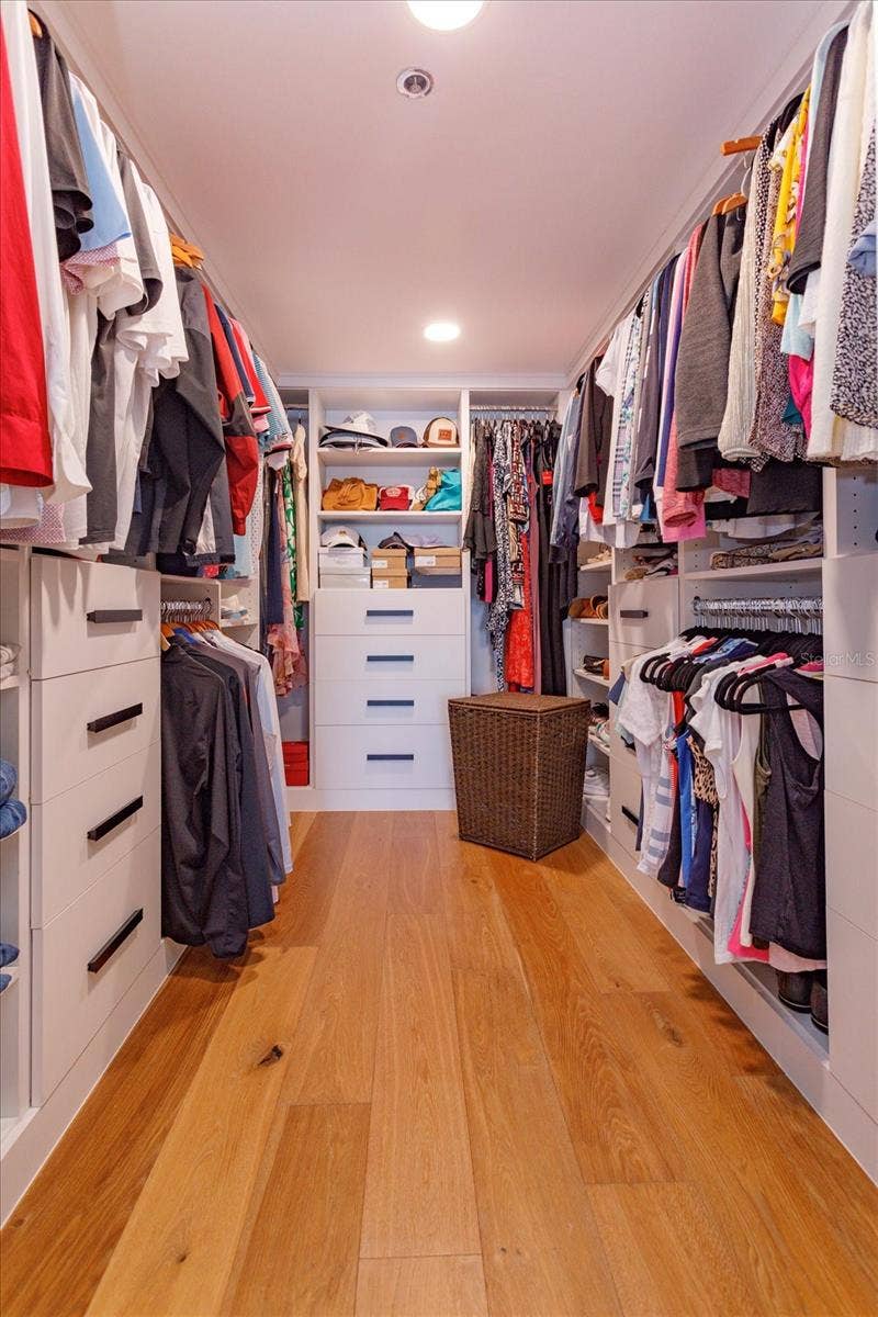 7550 HINSON STREET, #6A, Orlando, FL 32819 Primary custom closet