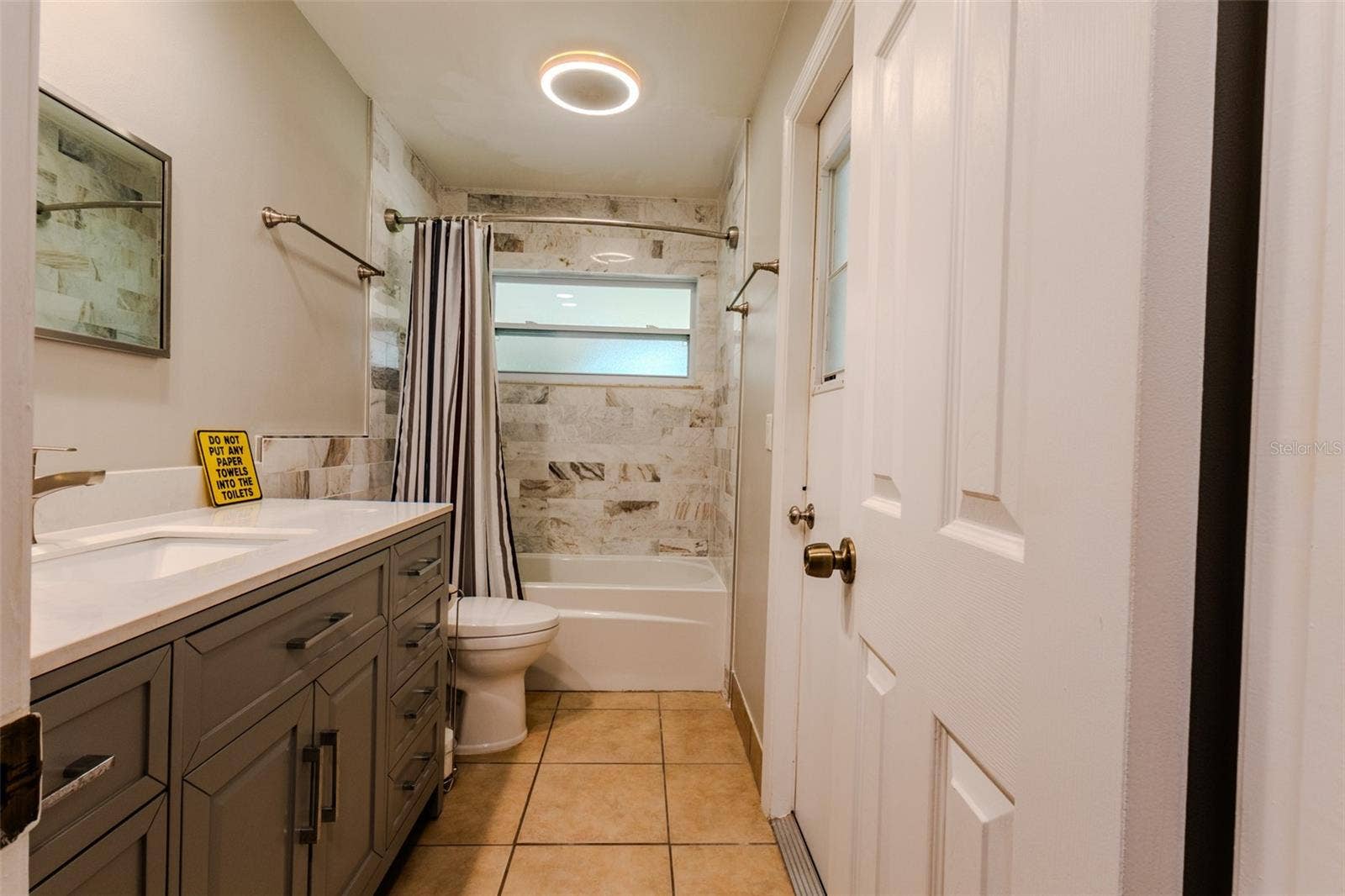 1861 CROWLEY CIRCLE E, Longwood, FL 32779 Guest bath with access door to porch/lanai
