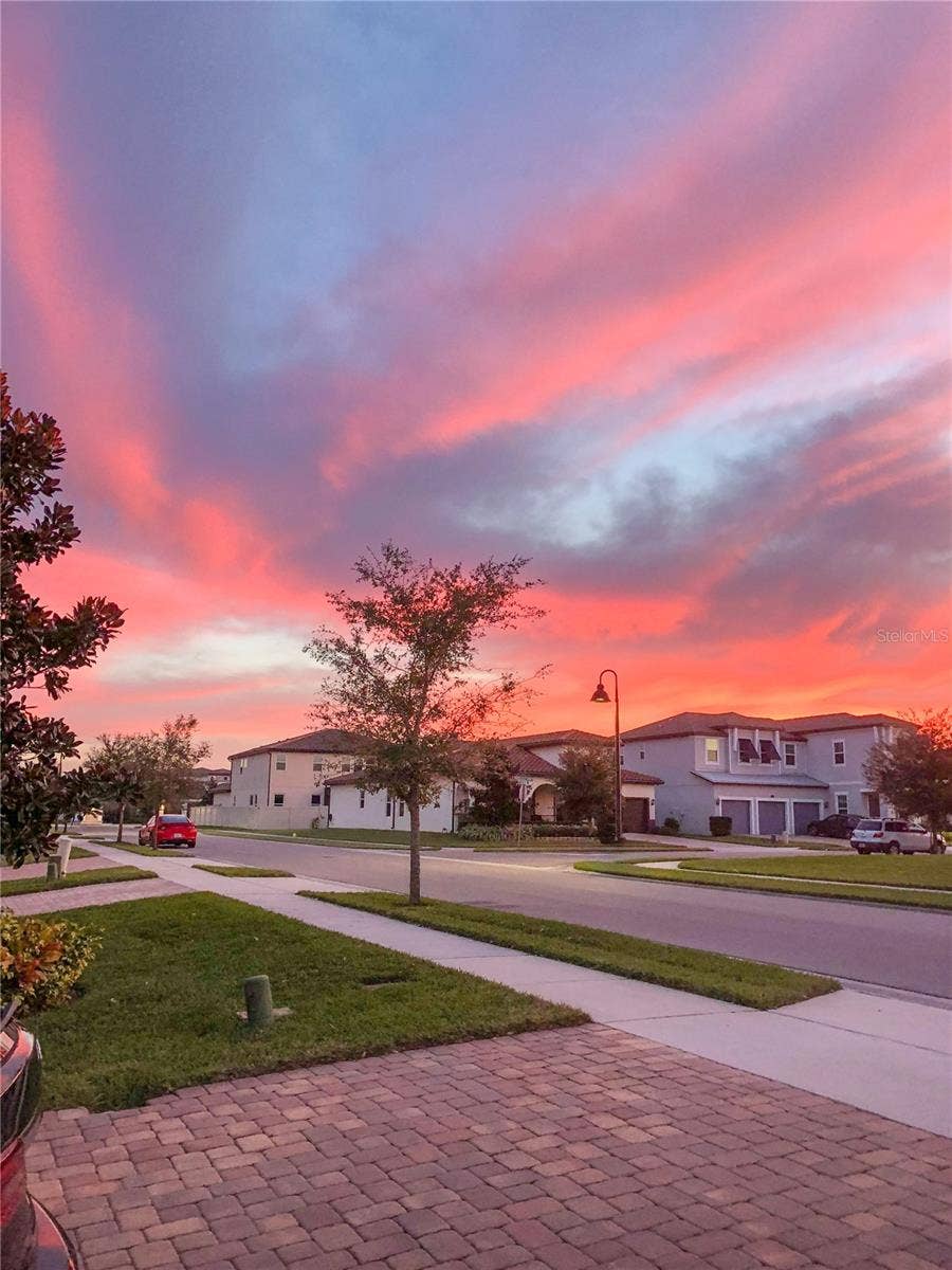 1651 AMSEL FALLS PARK TERRACE, Winter Garden, FL 34787 sunset view from front porch of the house.
