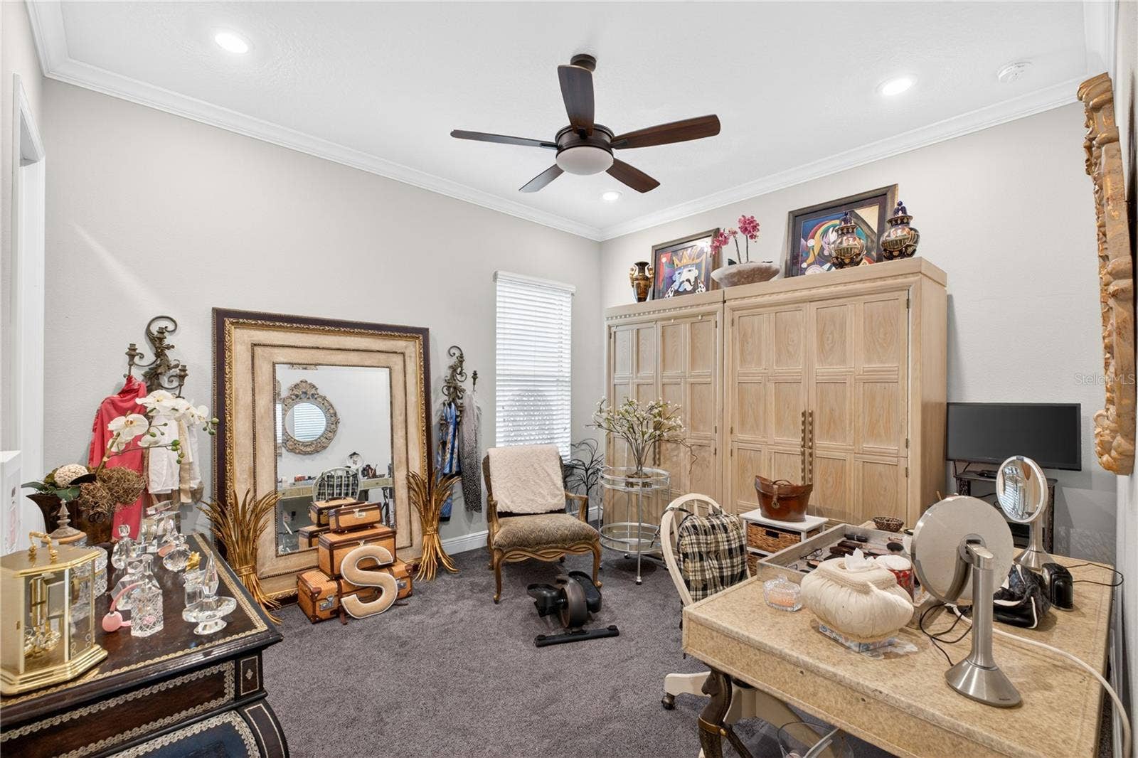 1651 AMSEL FALLS PARK TERRACE, Winter Garden, FL 34787 Second bedroom featuring carpeting and crown molding.