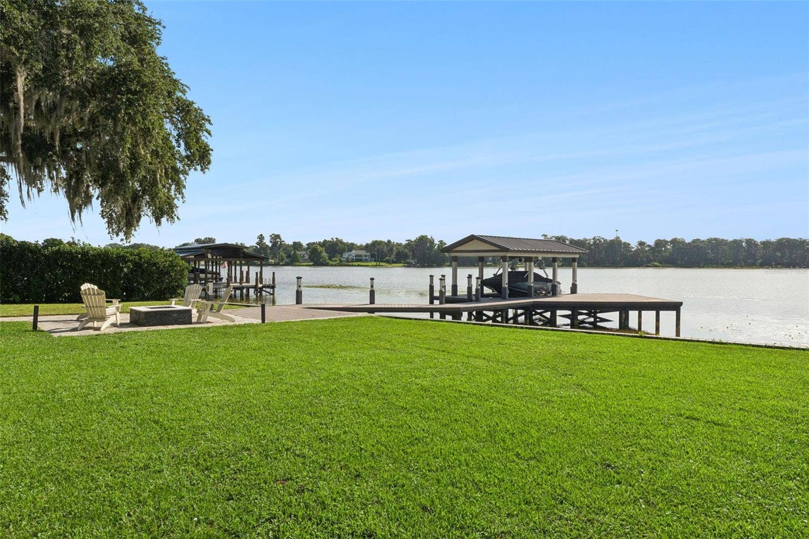 5583 JESSAMINE LANE, Orlando, FL 32839 Backyard and dock