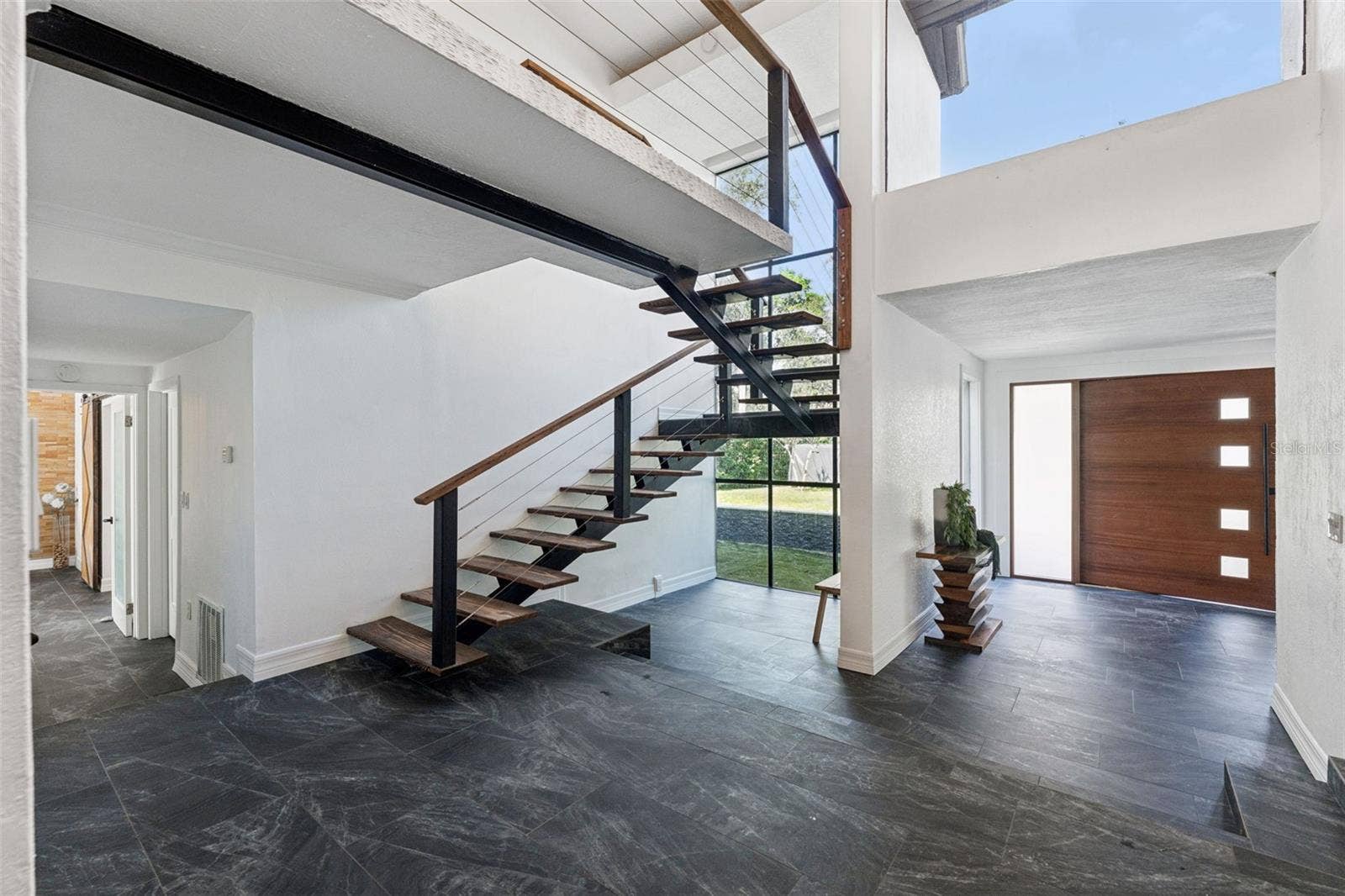 5583 JESSAMINE LANE, Orlando, FL 32839 Foyer and stair landing