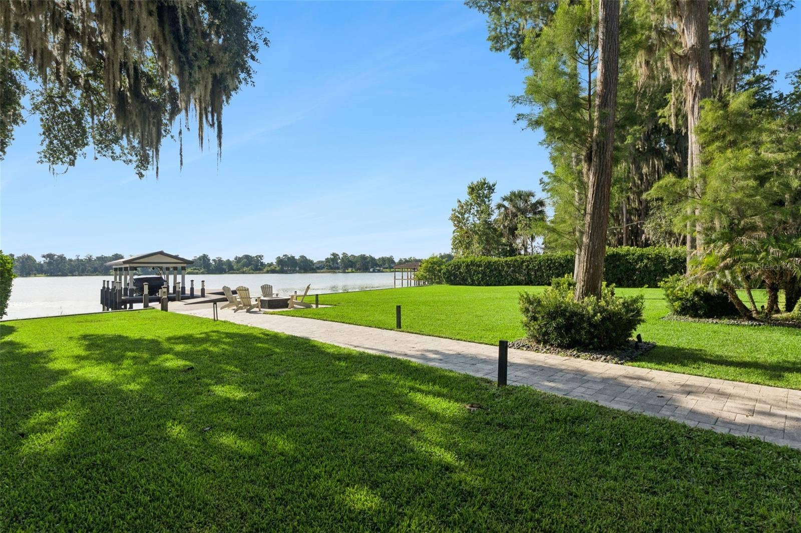 5583 JESSAMINE LANE, Orlando, FL 32839 Backyard and dock