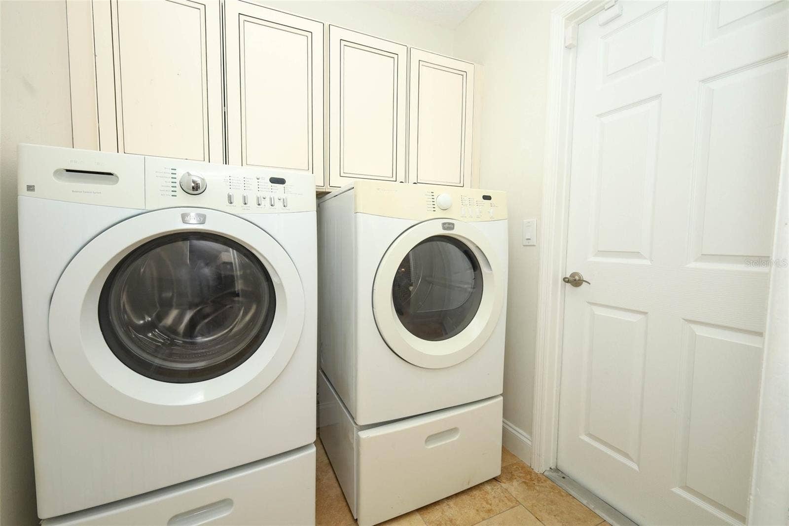Inside laundry room.