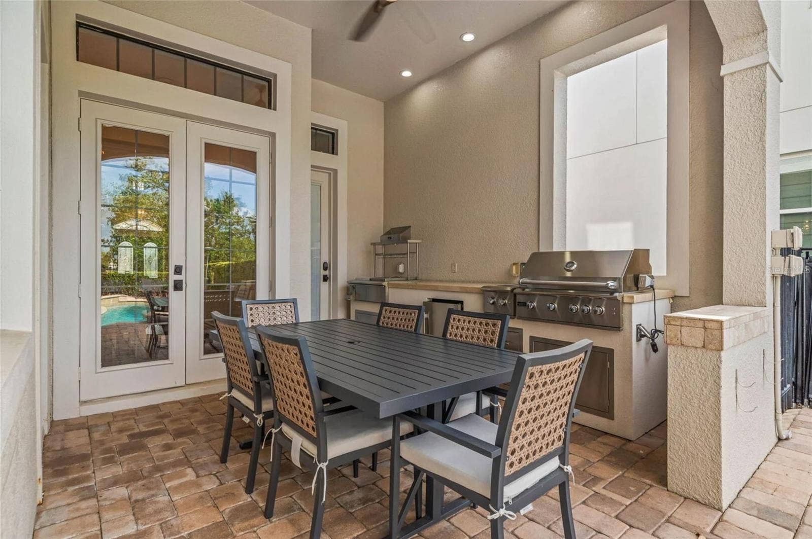 304 MUIRFIELD LOOP, Reunion, FL 34747 Shaded outdoor dining