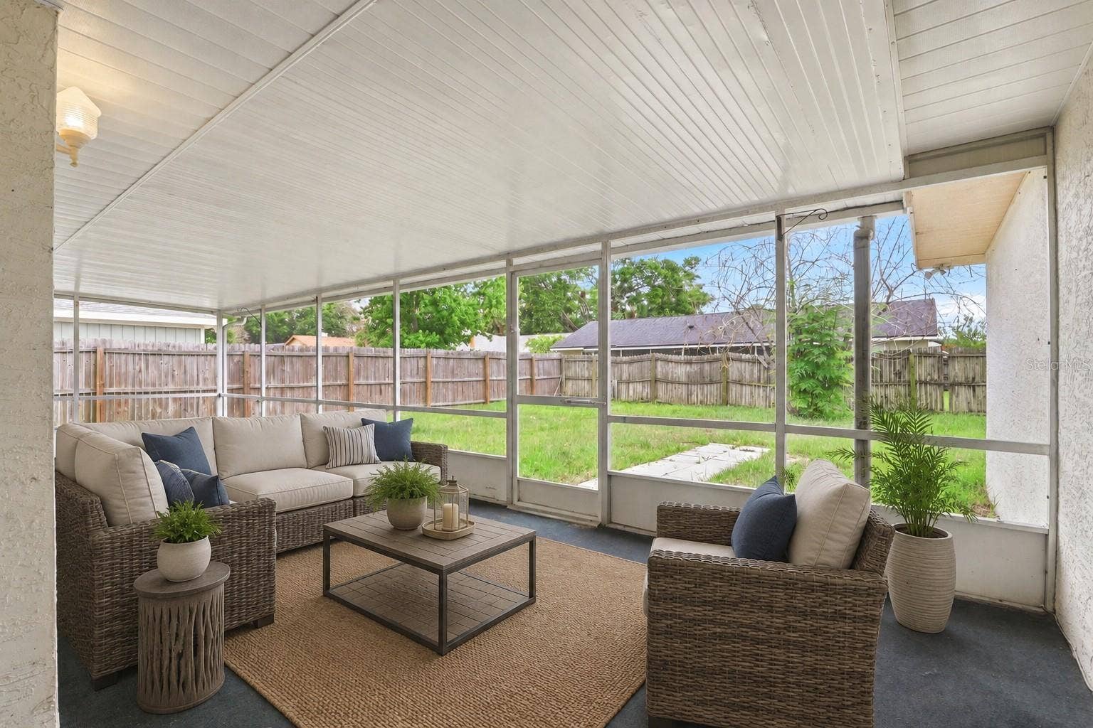 7320 WETHERSFIELD DRIVE, Orlando, FL 32819 Virtually Stagged Screened Patio