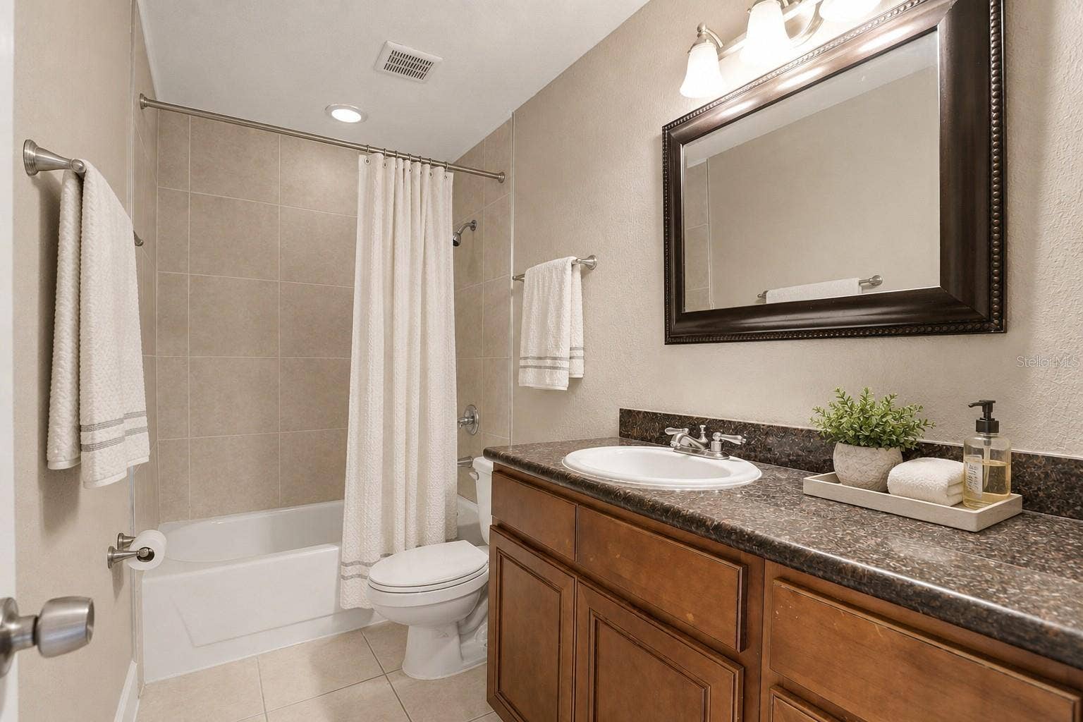 7320 WETHERSFIELD DRIVE, Orlando, FL 32819 Virtually Stagged Secondary Bathroom