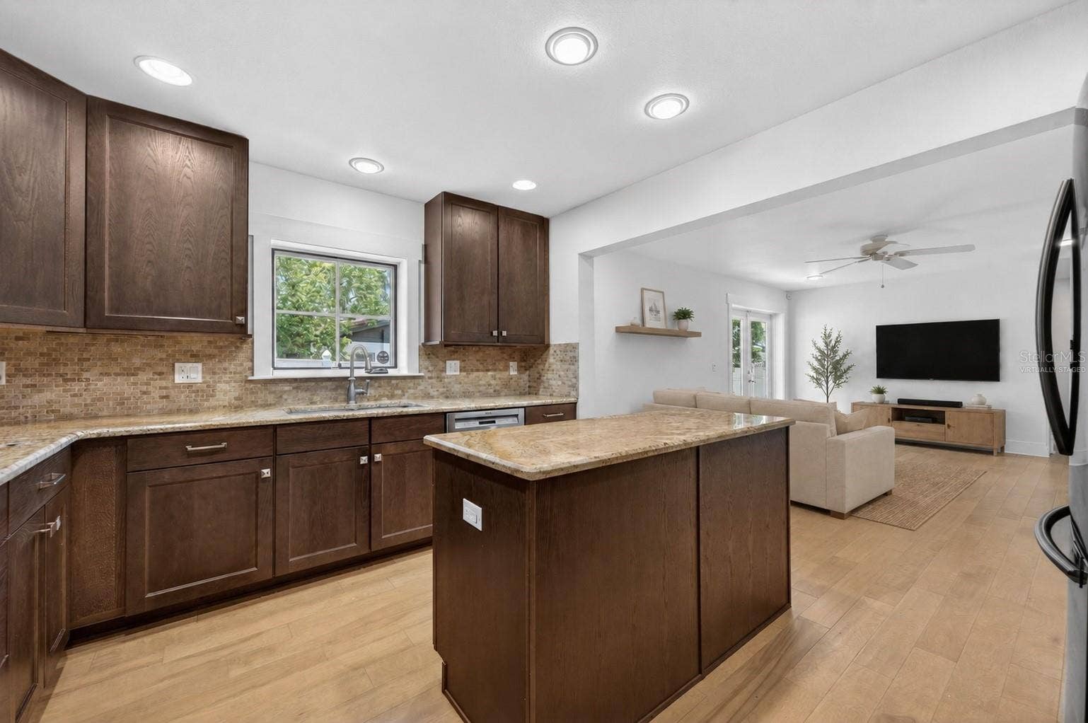1265 ARLINGTON PL, Winter Park, FL 32789 Open concept kitchen & living room - virtually staged
