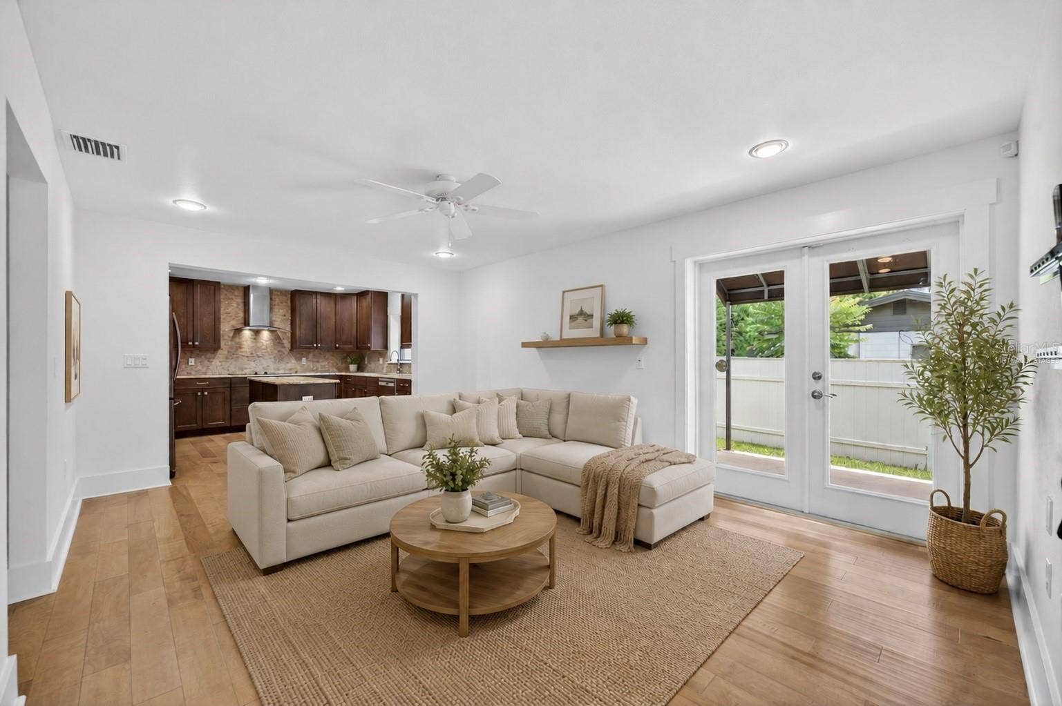 1265 ARLINGTON PL, Winter Park, FL 32789 Open living room & kitchen - virtually staged