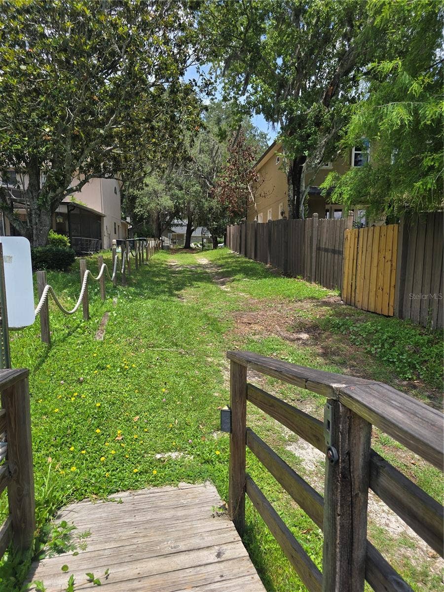 8433 COMMANDER COVE, Winter Park, FL 32792 Walk way to the lake view 2