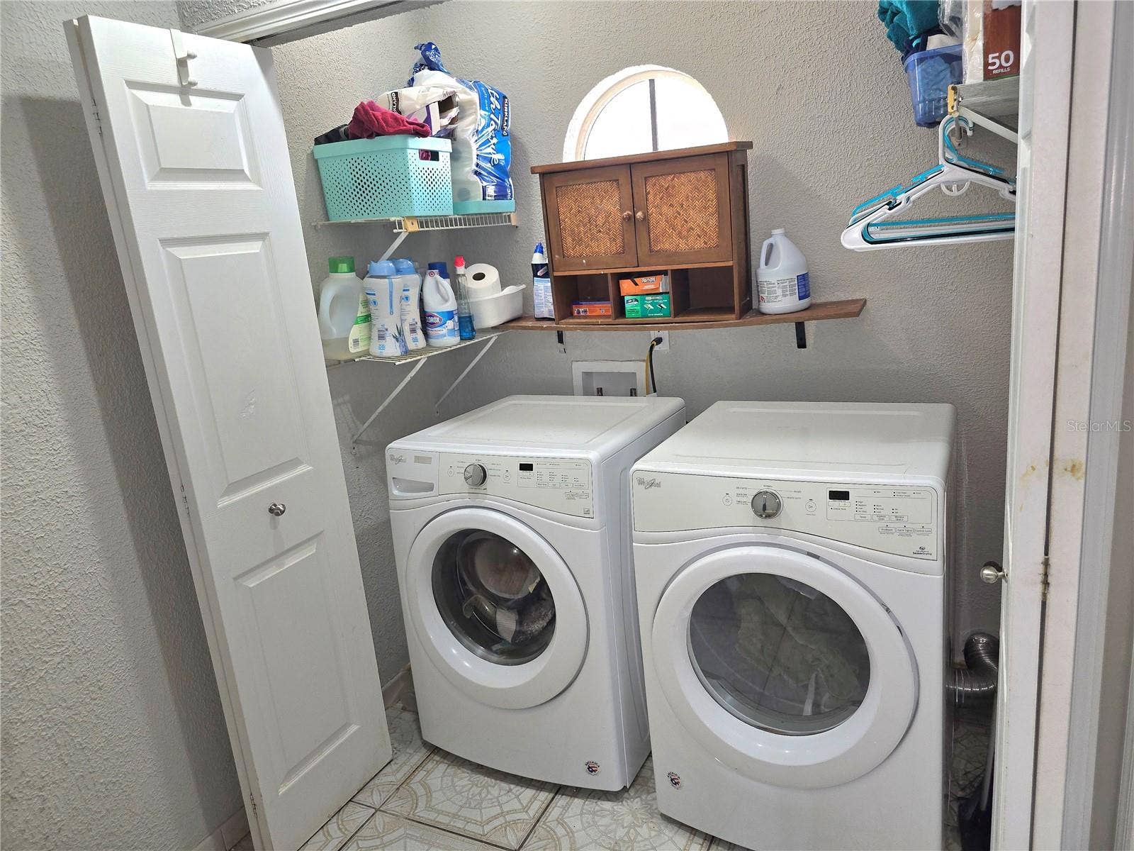 8433 COMMANDER COVE, Winter Park, FL 32792 Laundry Room inside Half bath