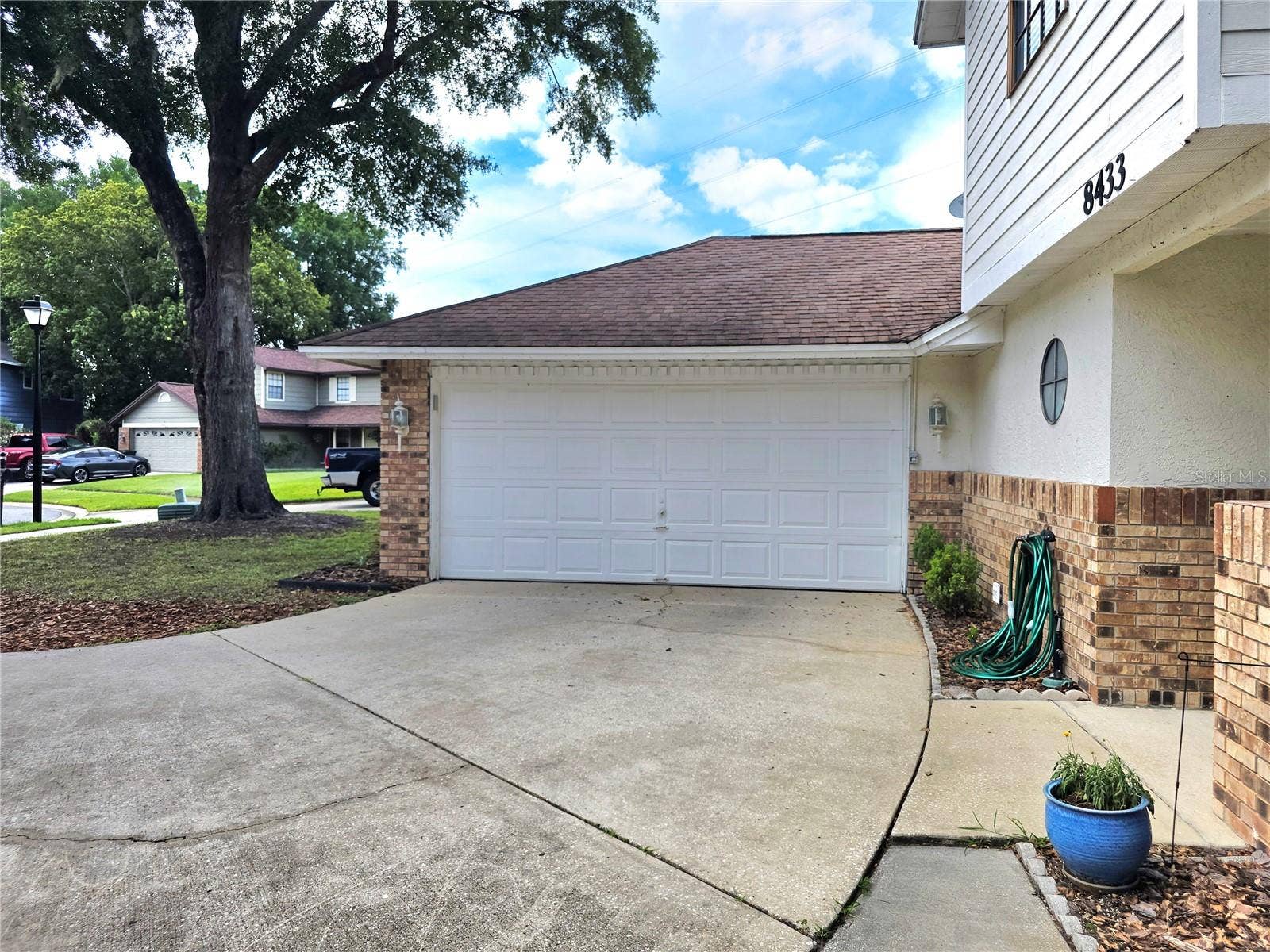8433 COMMANDER COVE, Winter Park, FL 32792 Front Garage View