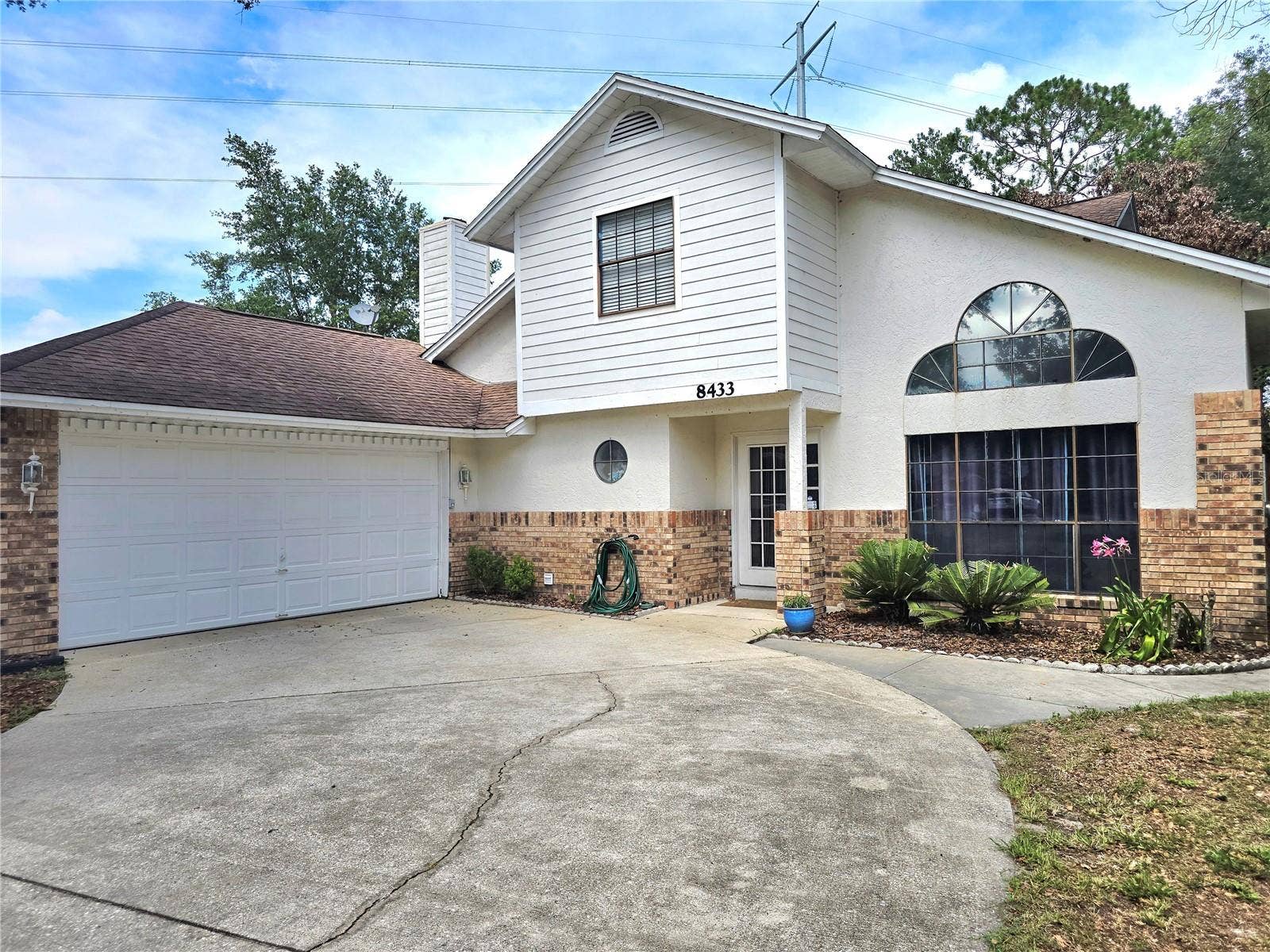 8433 COMMANDER COVE, Winter Park, FL 32792 Front of house