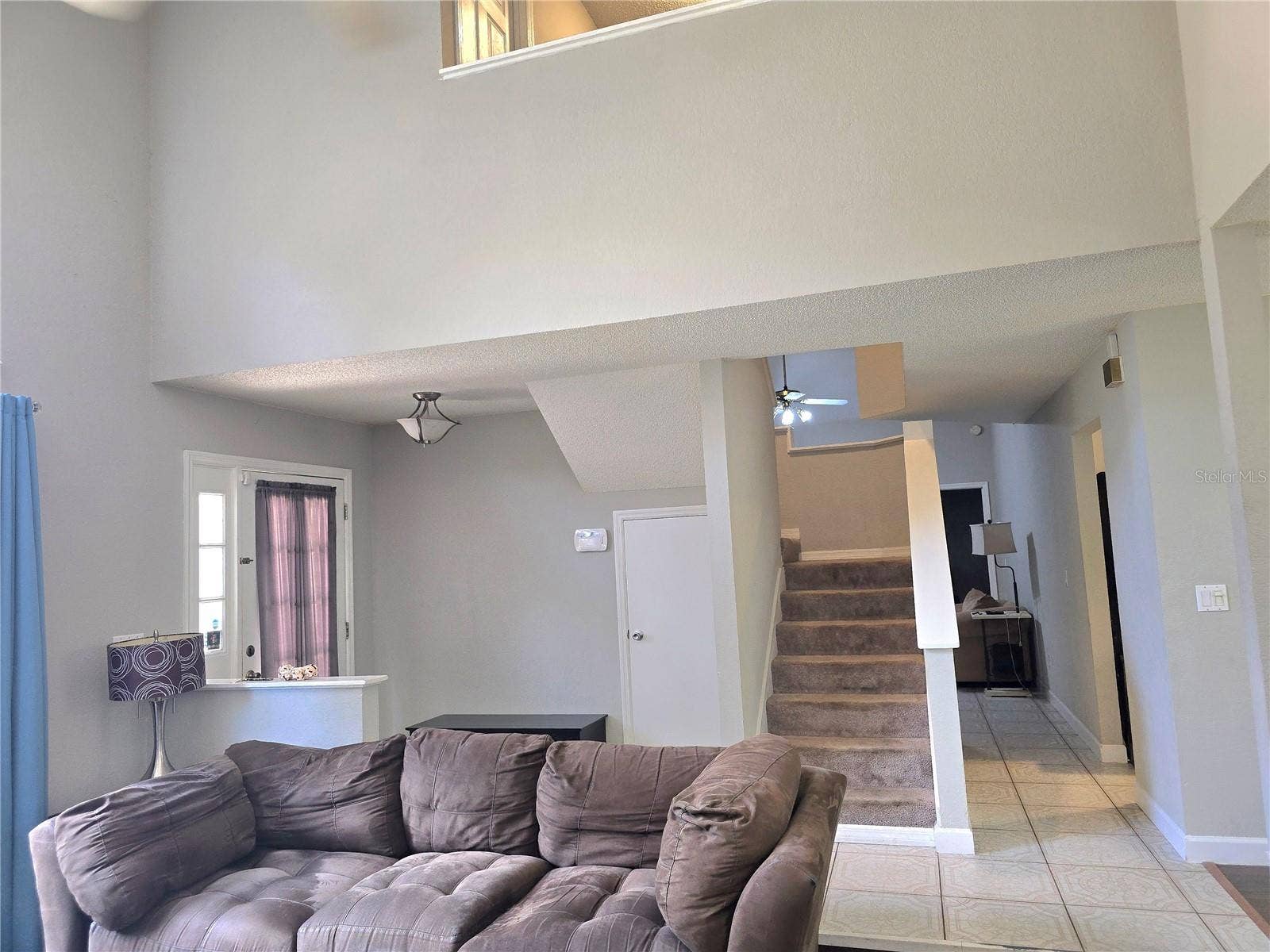 8433 COMMANDER COVE, Winter Park, FL 32792 Living room view 2
