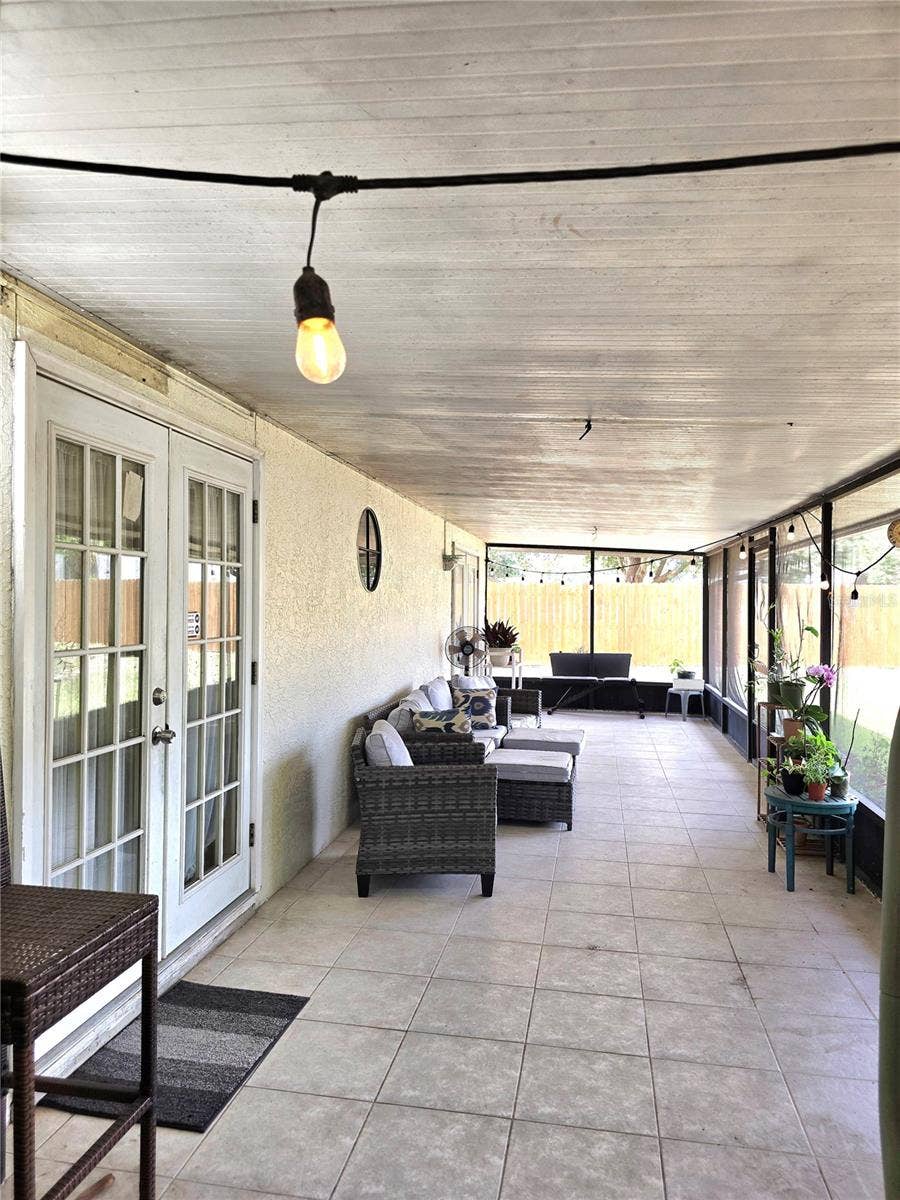 8433 COMMANDER COVE, Winter Park, FL 32792 Back Porch Lani