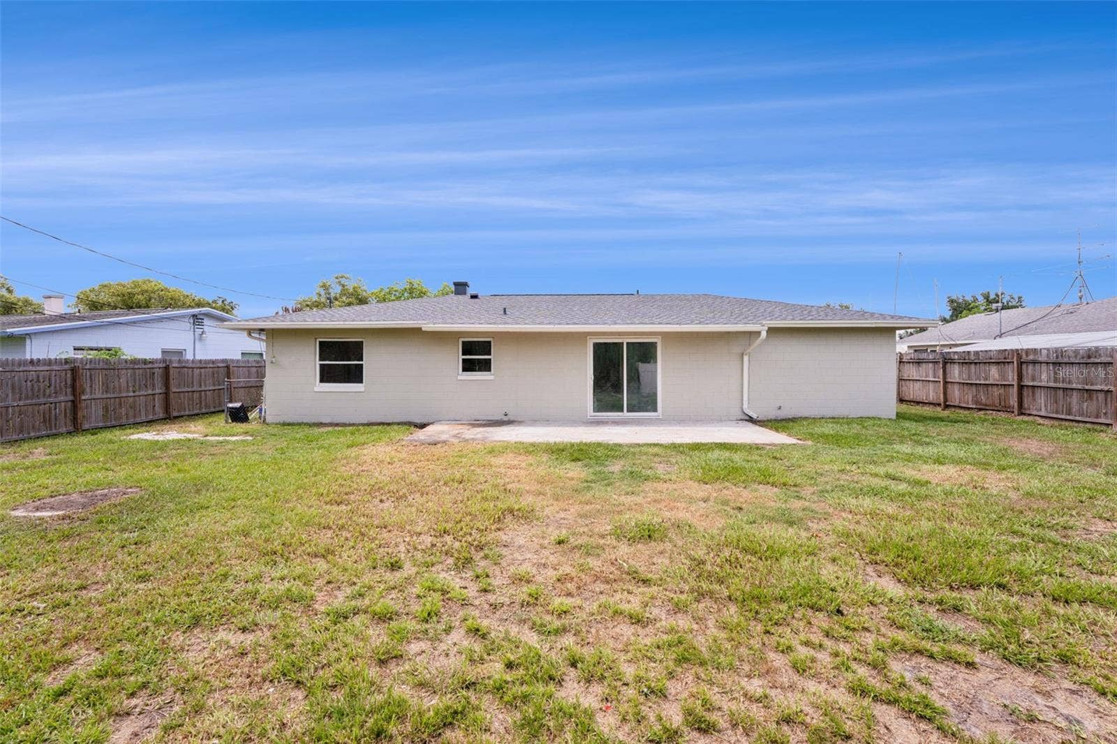 Large Fenced-in Back Yard with Patio