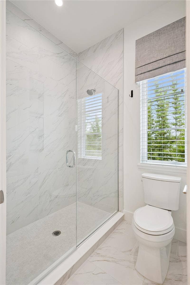 512 W SWOOPE AVENUE, Winter Park, FL 32789 Shared Ensuite with Large Walk-In Shower that services Bedrooms Two and Three