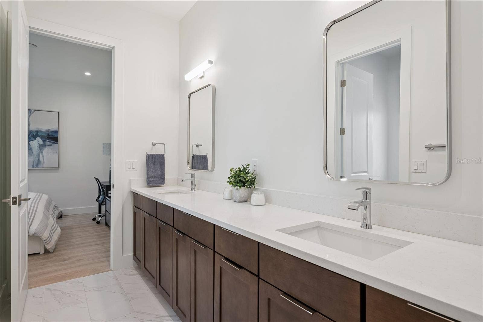 512 W SWOOPE AVENUE, Winter Park, FL 32789 Shared Ensuite with Dual Sinks that services Bedrooms Two and Three
