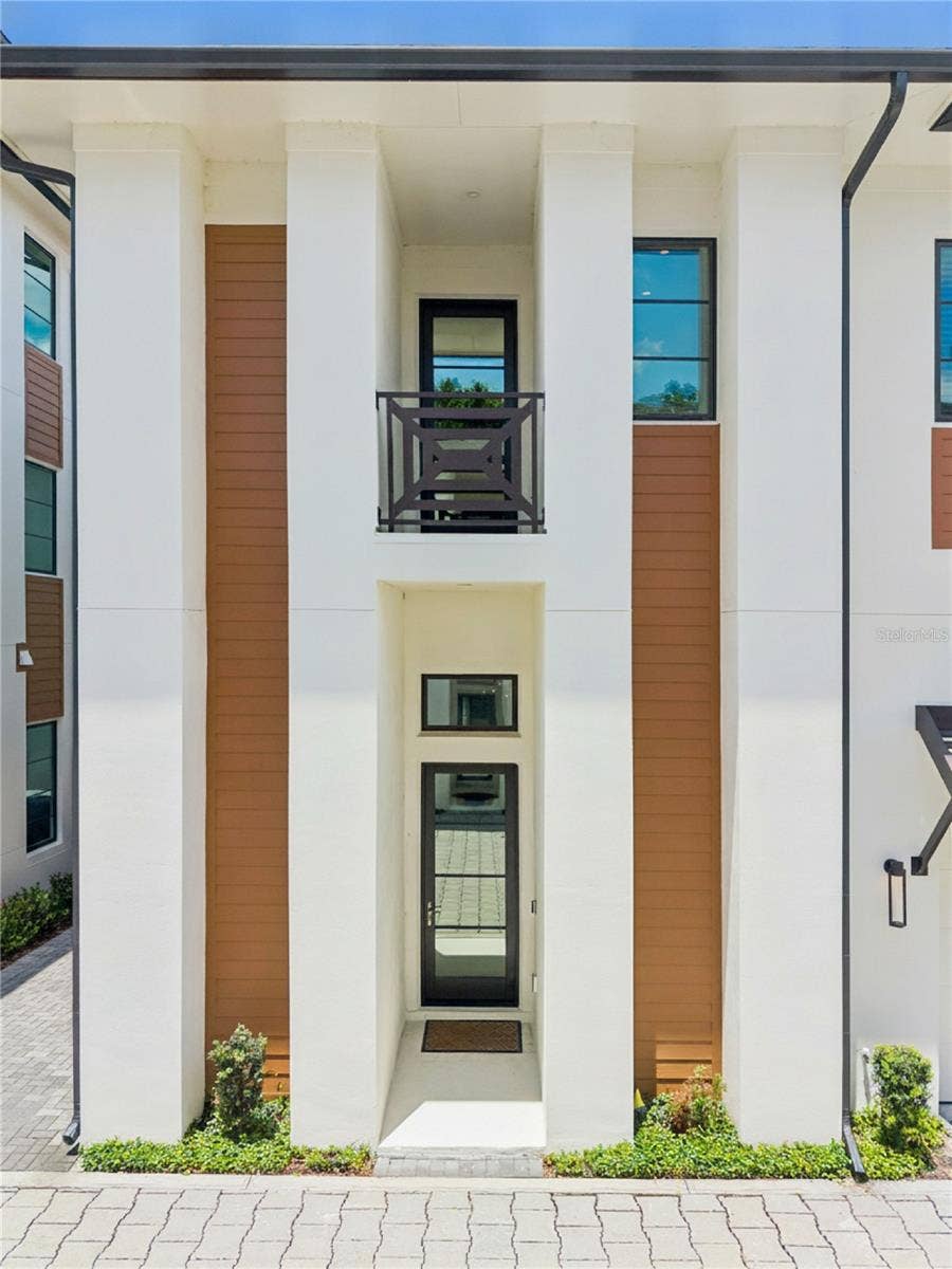 512 W SWOOPE AVENUE, Winter Park, FL 32789 Luxury Winter Park Townhome: 3 Bedrooms/2.5 Baths/In-Unit Elevator and Private Fenced-In Backyard
