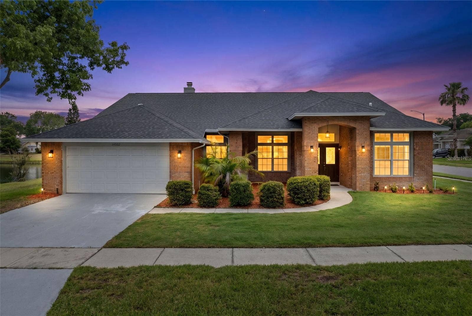 14502 POTANOW TRAIL, Orlando, FL 32837 Welcome to a beautifully maintained brick home on a .22 acre corner lot in the heart of Hunter's Creek. This 3 bedroom plus office home sits on a peaceful pond lot w/ no neighbors on either side, offering the kind of privacy & space that's hard to find.