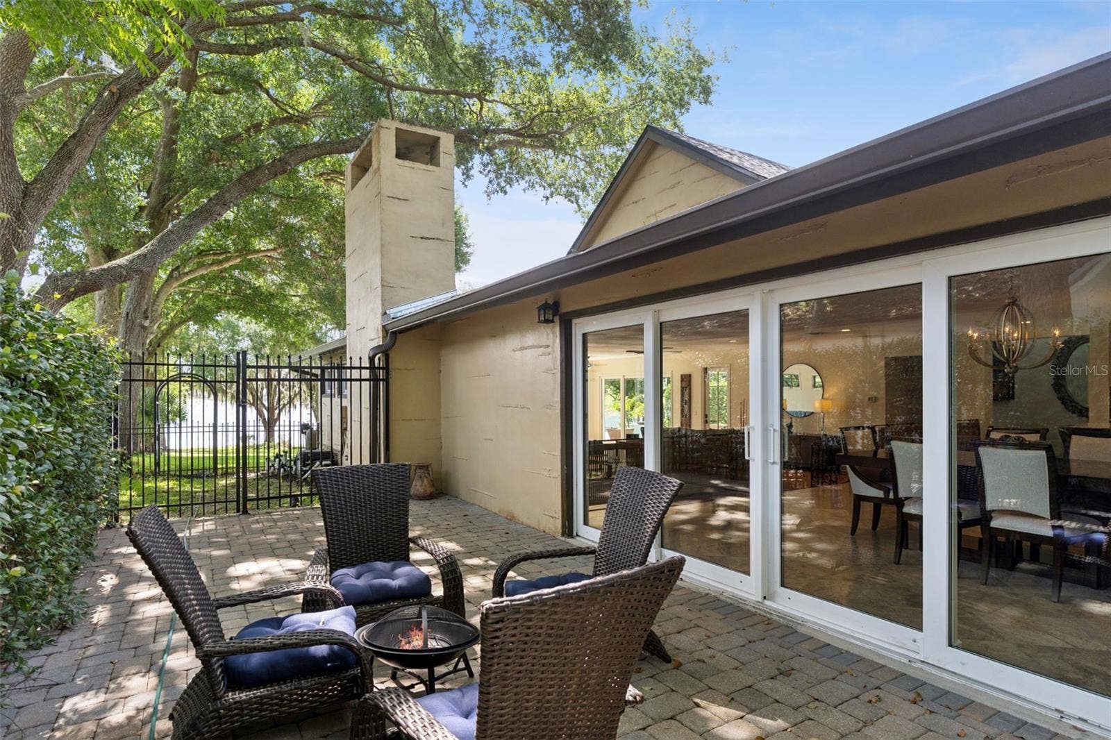 1629 HEMPEL AVENUE, Windermere, FL 34786 Garden Patio. Quiet area for sitting around the fire.
