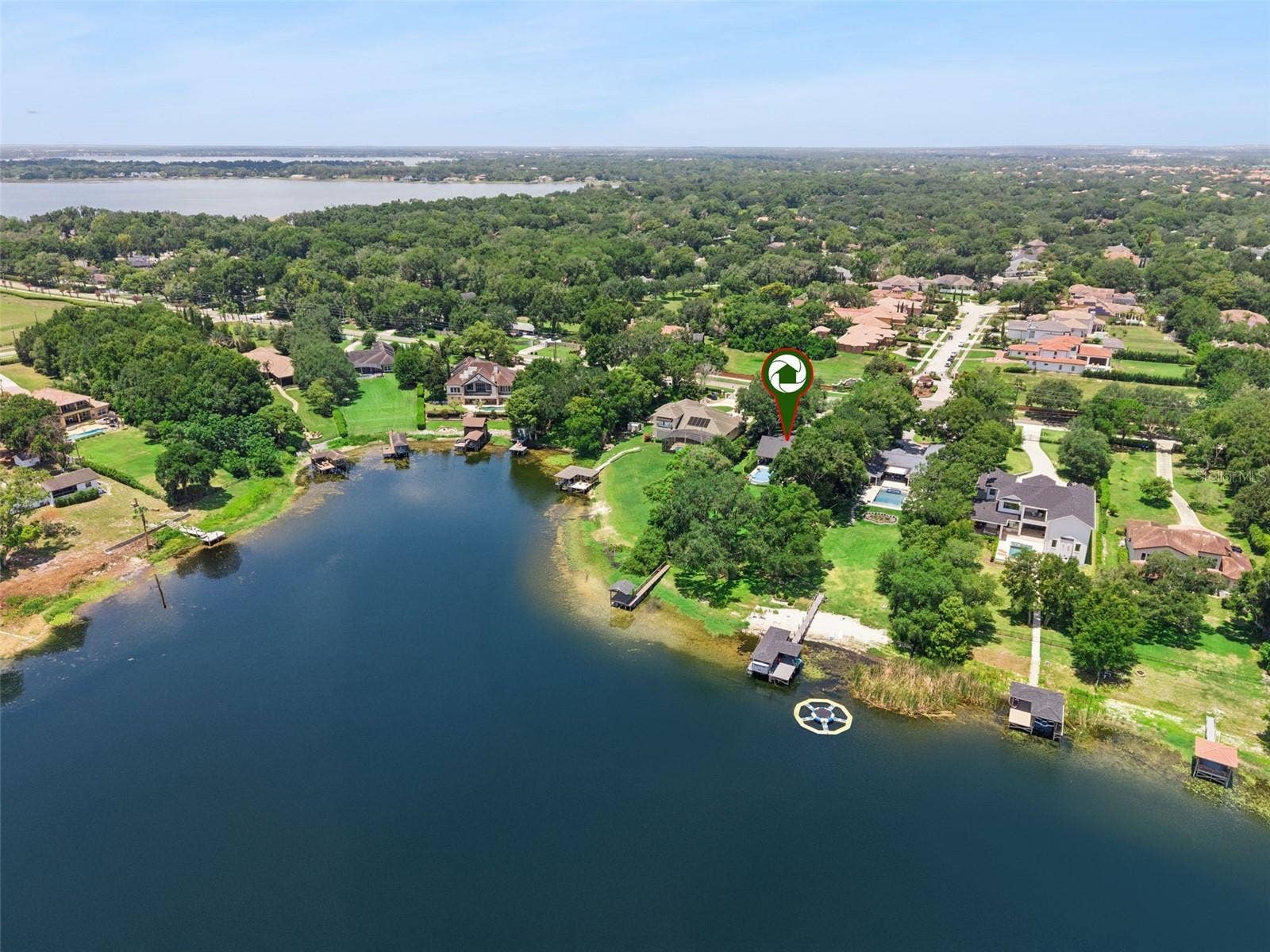 1629 HEMPEL AVENUE, Windermere, FL 34786 Lake Olivia is an 88 acre private lake. Chain of Lakes in the background