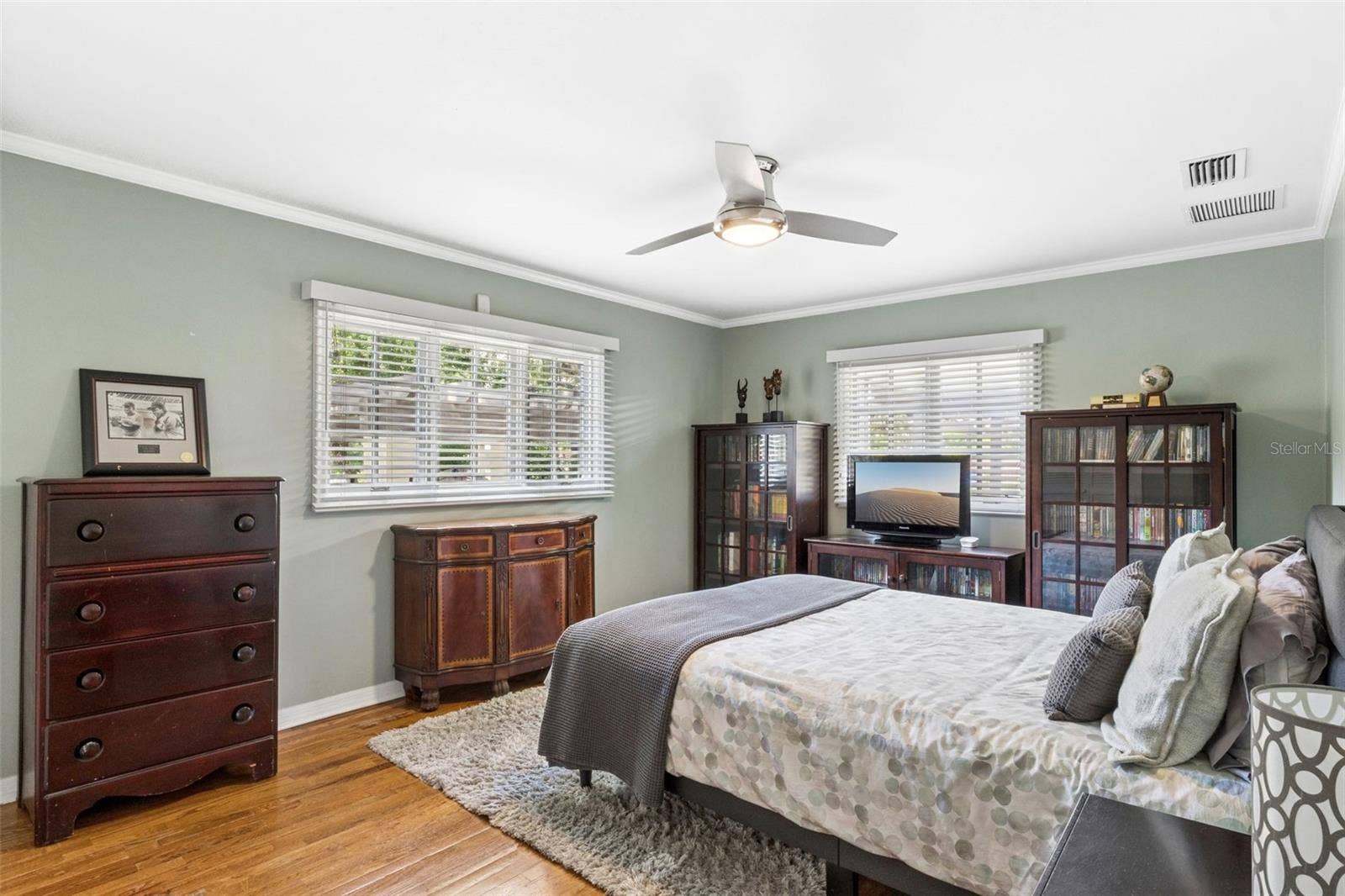 1629 HEMPEL AVENUE, Windermere, FL 34786 Bedroom #3 featuring customed closet and natural wood floors.