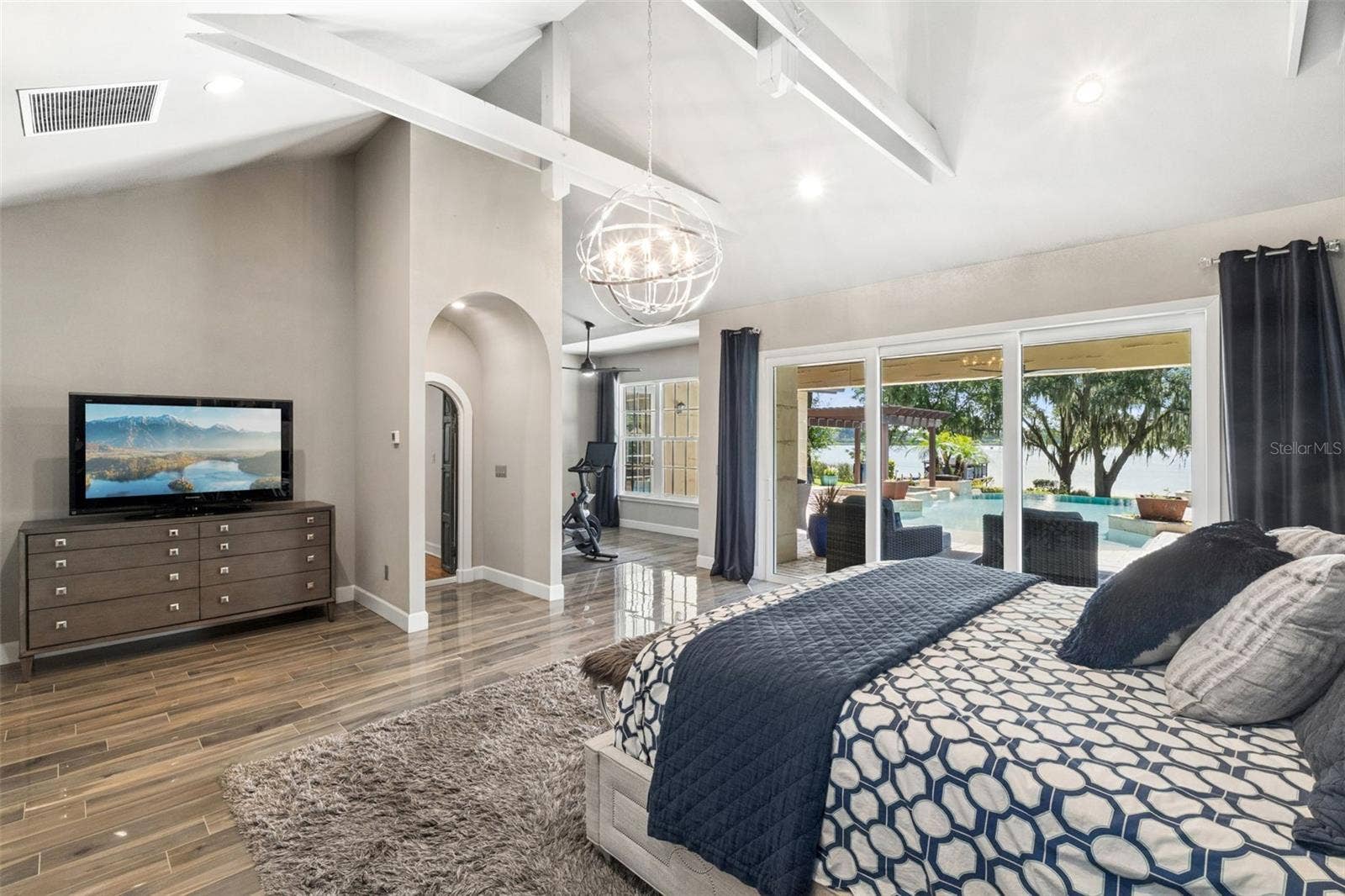 1629 HEMPEL AVENUE, Windermere, FL 34786 Spacious Primary Bdroom with Flex room, vaulted ceilings with beams and of course a view of the Lake and the Pool!!!!