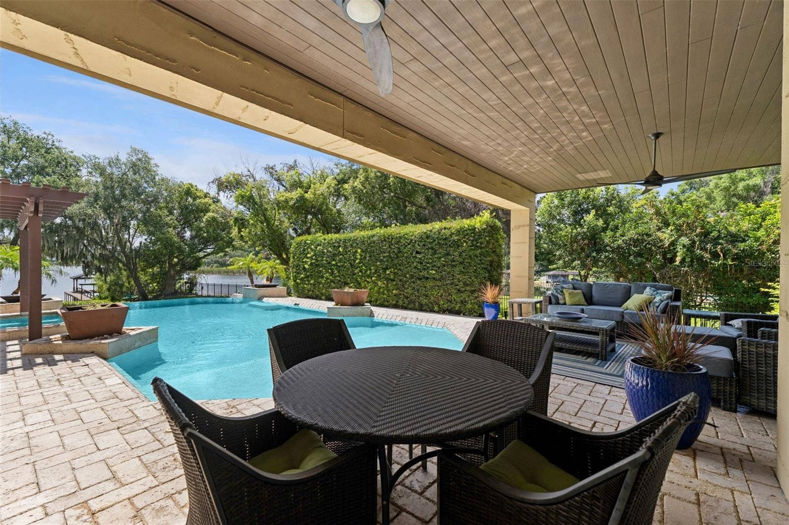 1629 HEMPEL AVENUE, Windermere, FL 34786 Lanai large enough for a dinette table and lounges
