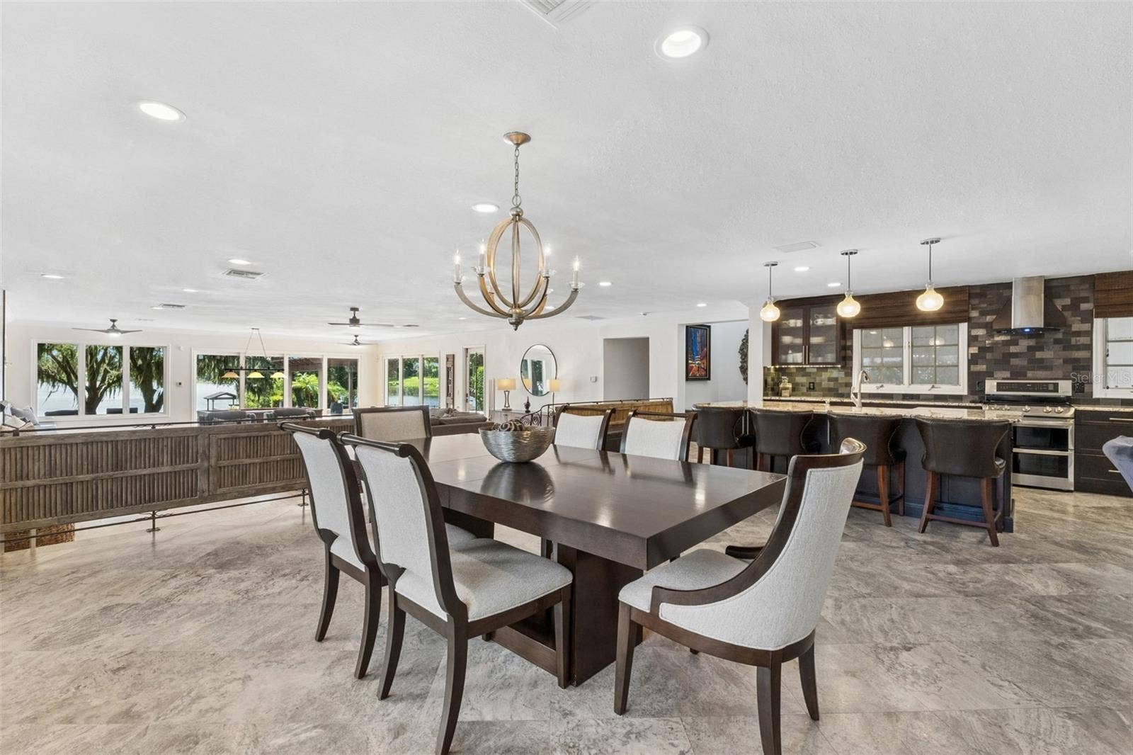 1629 HEMPEL AVENUE, Windermere, FL 34786 Travertine Floors and Ornamental Lights make this space POP