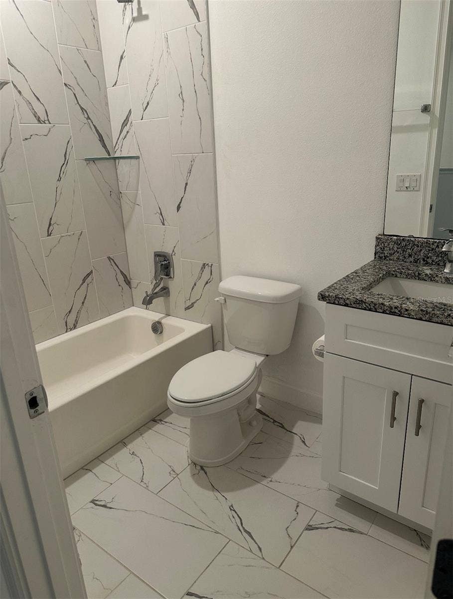 upstairs bathroom with tub