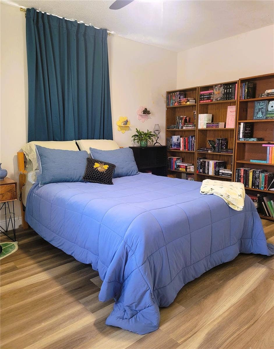2732 WALNUT STREET, Orlando, FL 32806 Primary Bedroom has hard floors and en-suite Bathroom.
