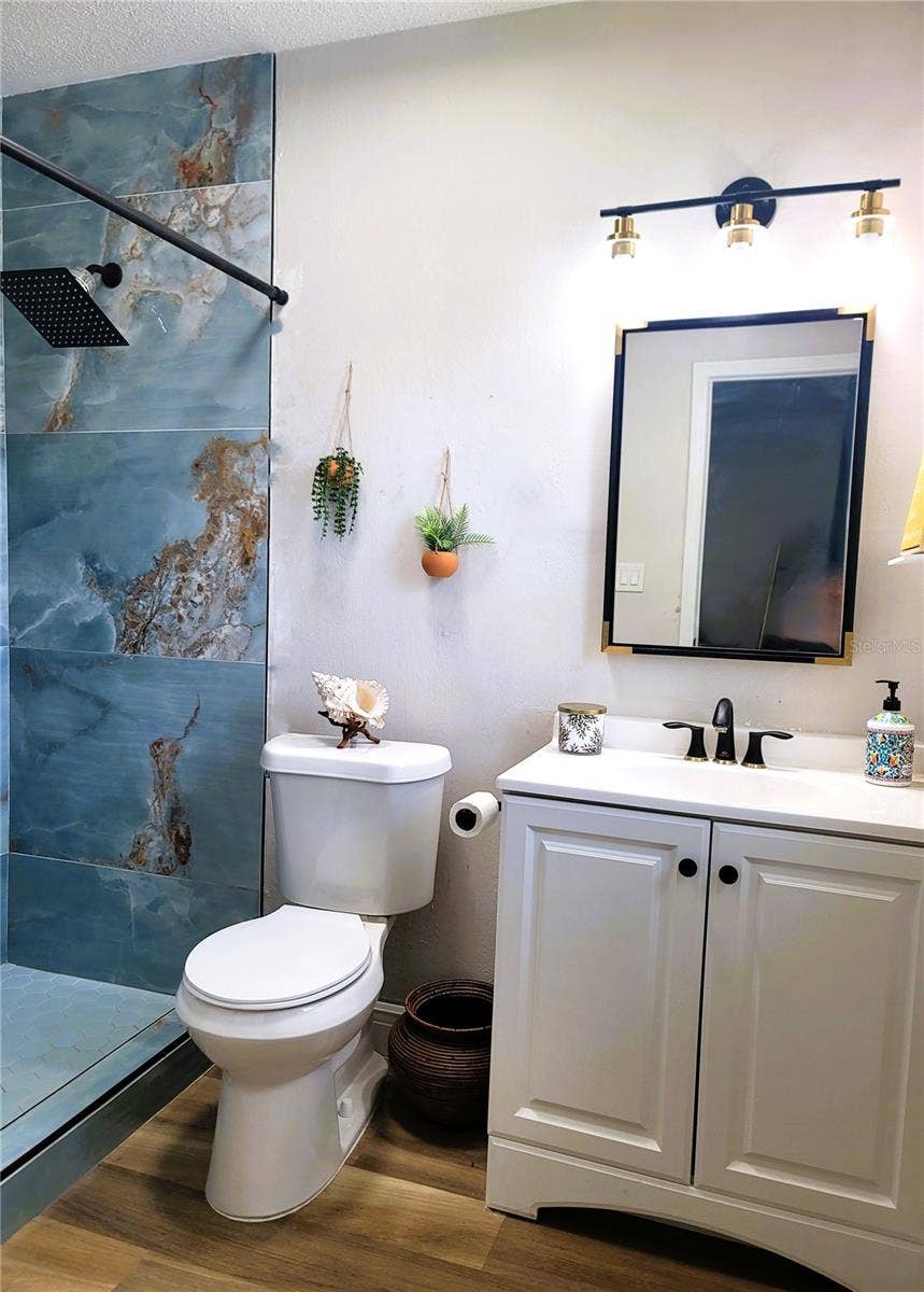 2732 WALNUT STREET, Orlando, FL 32806 Primary Bathroom - and BEAUTIFUL custom tile walk-in shower.... 2 shower heads