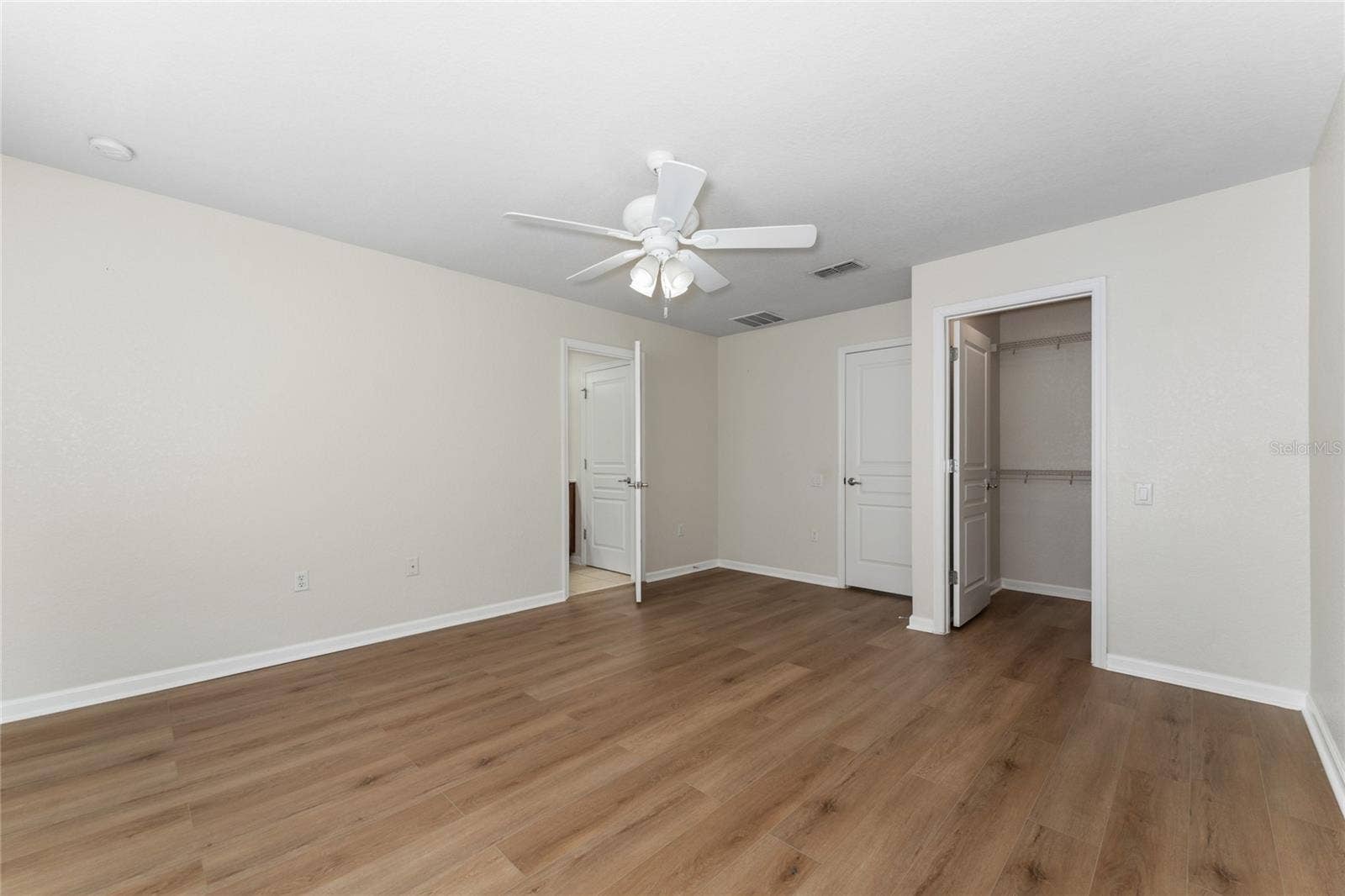 7723 FAIRGROVE AVENUE, Windermere, FL 34786 Master bedroom with walk-in closet