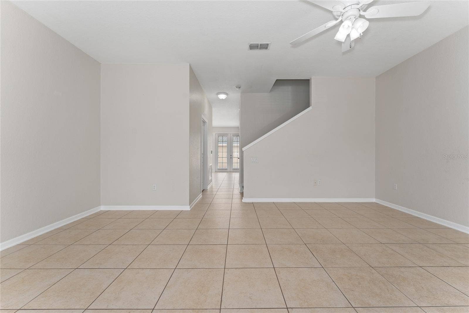 7723 FAIRGROVE AVENUE, Windermere, FL 34786 Family room upon entering front door