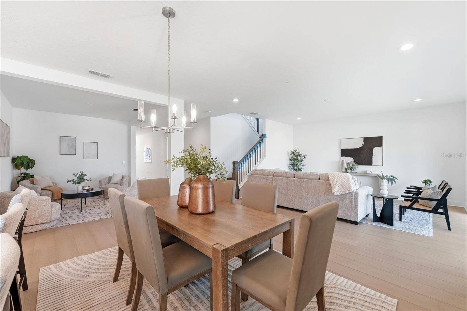 1527 RIDGEBACK LANE, Apopka, FL 32703 Open concept living with dining room in the center
