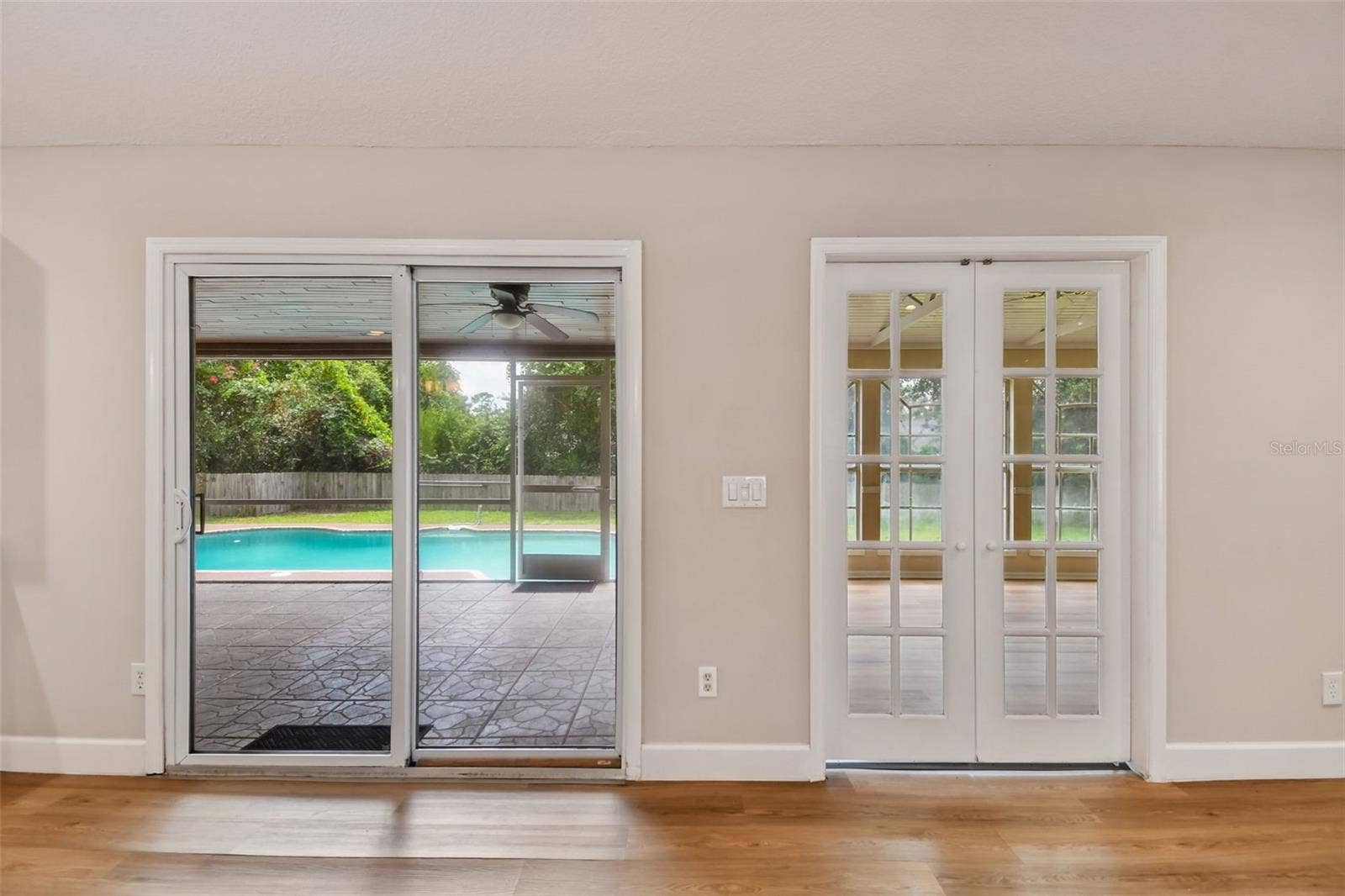 755 KEENELAND PIKE, Lake Mary, FL 32746 Great Room overlooking enclosed Bonus Room, Enclosed Porch, and Pool.