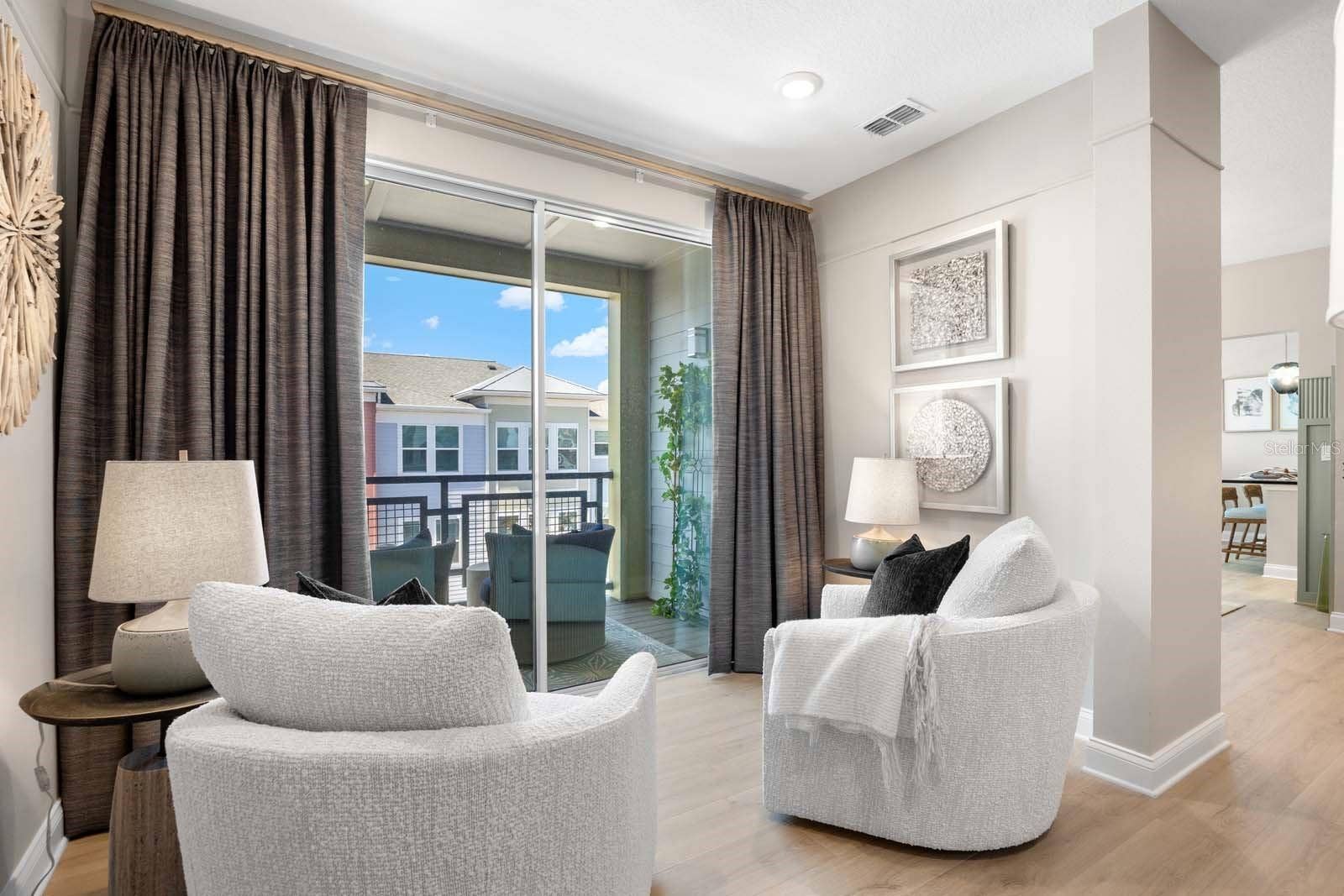 7557 LAUREATE BOULEVARD, #6407, Orlando, FL 32827 Seating Area and Balcony