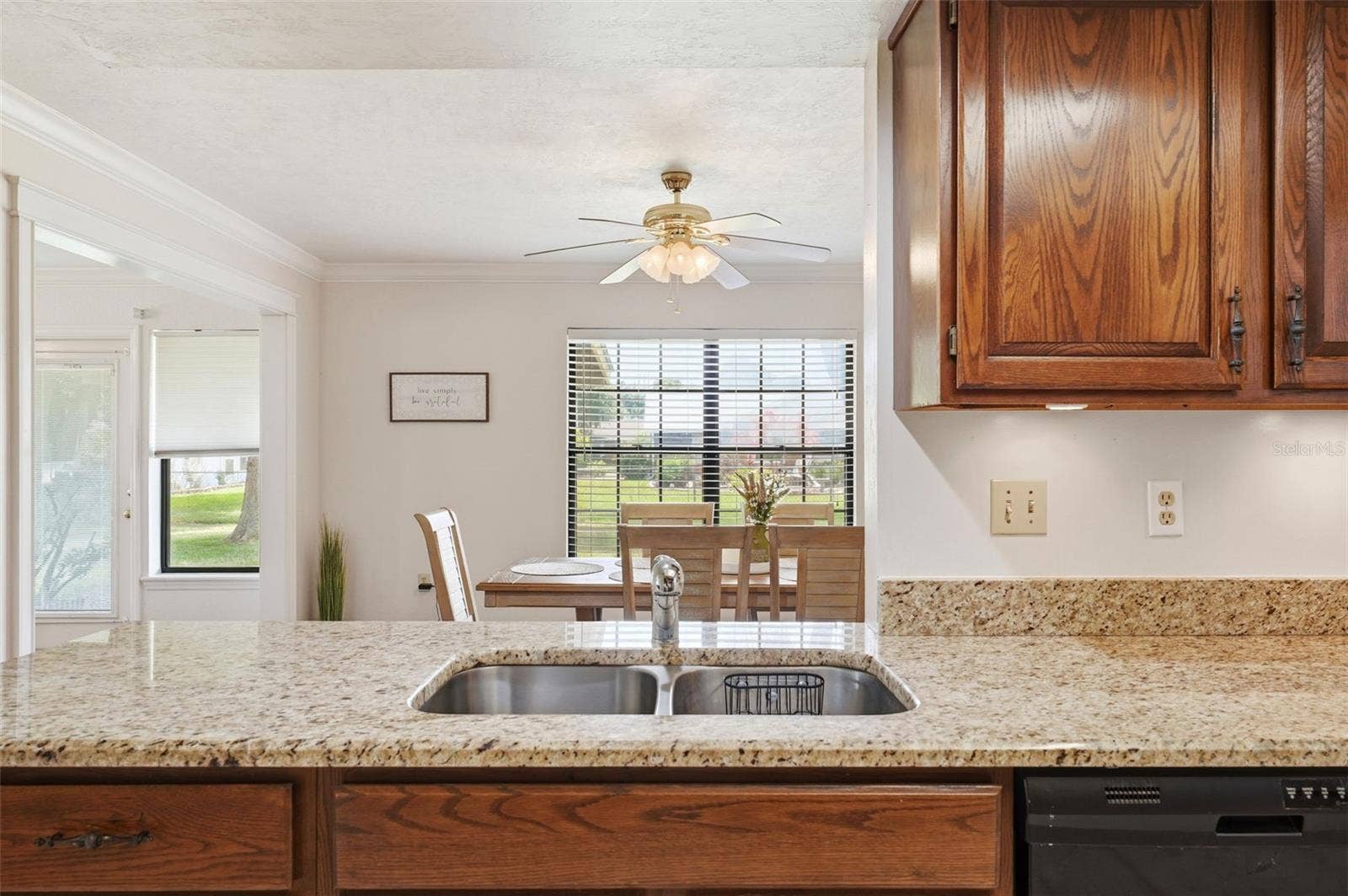 1805 VIRGINIA COURT, Tavares, FL 32778 Kitchen view into Dinning Room