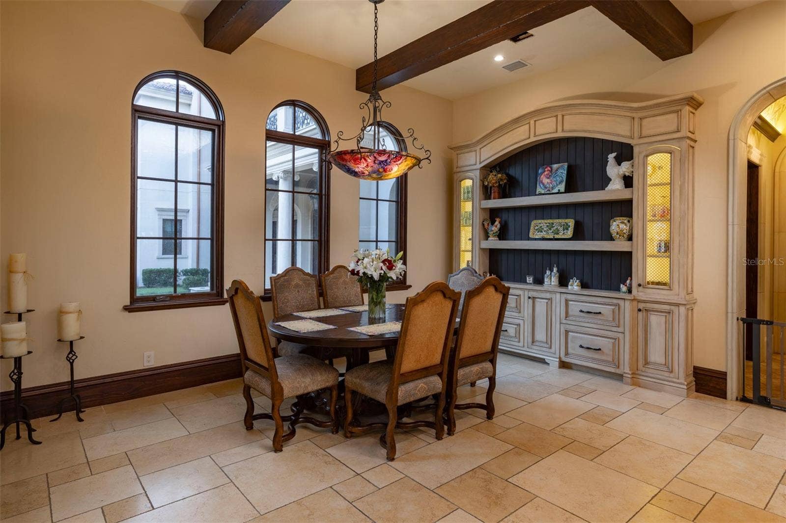 6119 GROSVENOR SHORE DRIVE, Windermere, FL 34786 eat in kitchen nook with inset built in details and beamed ceilings
