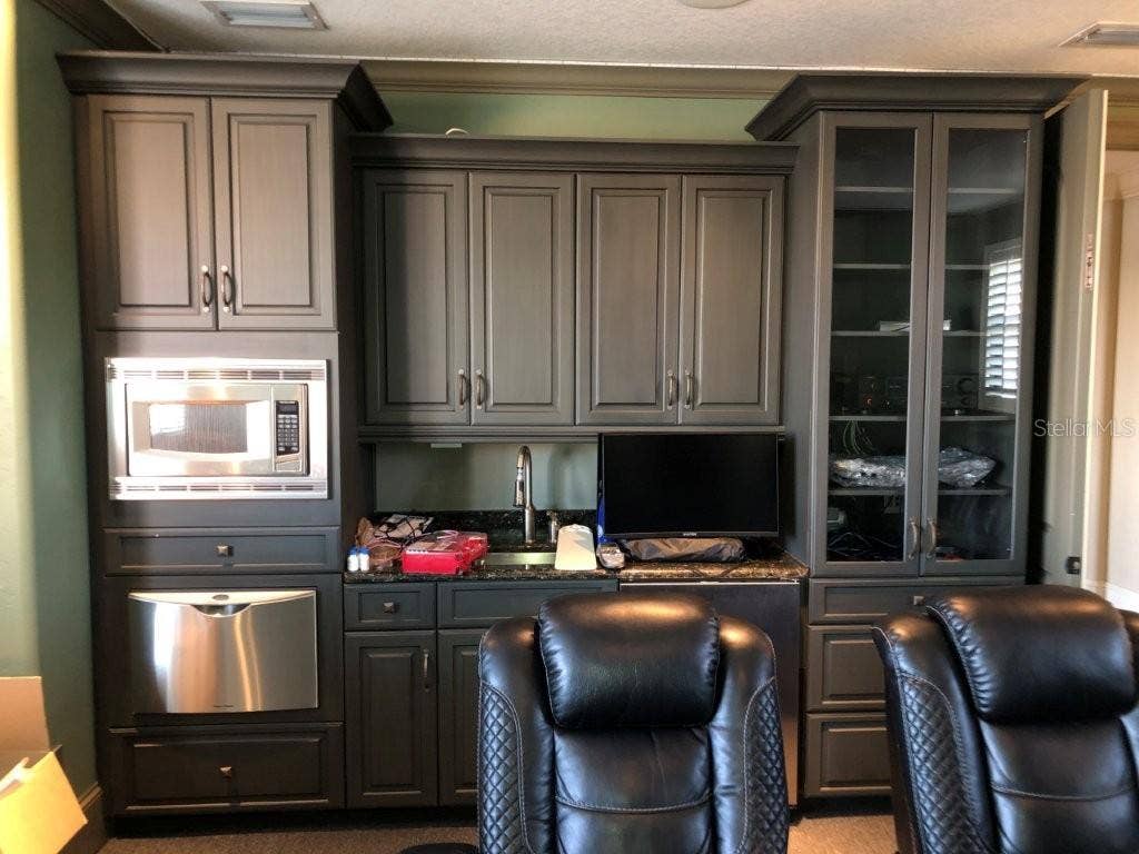 1238 LAKE WHITNEY DRIVE, Windermere, FL 34786 Theater room entertainment center